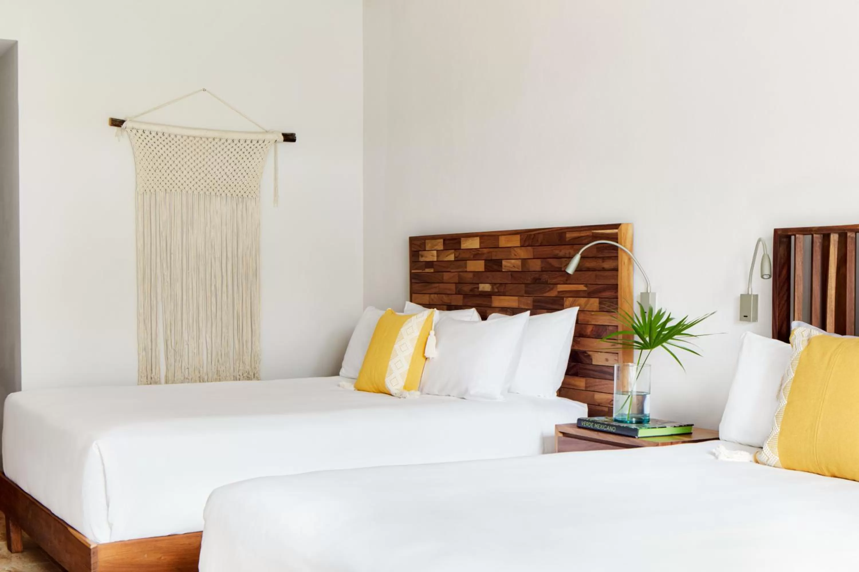 Bed in Kimpton Aluna Resort Tulum by IHG
