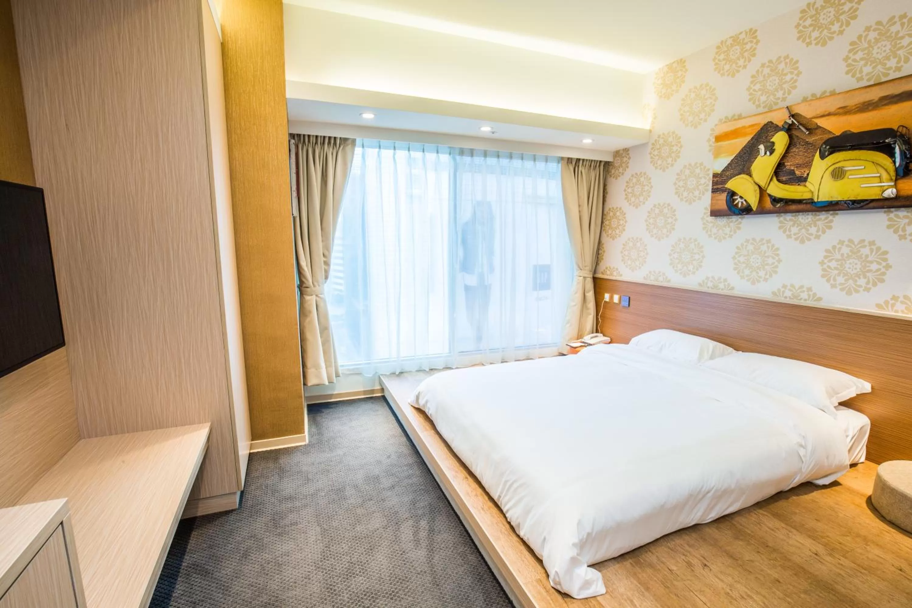 Bed in Walker Hotel. Ximen