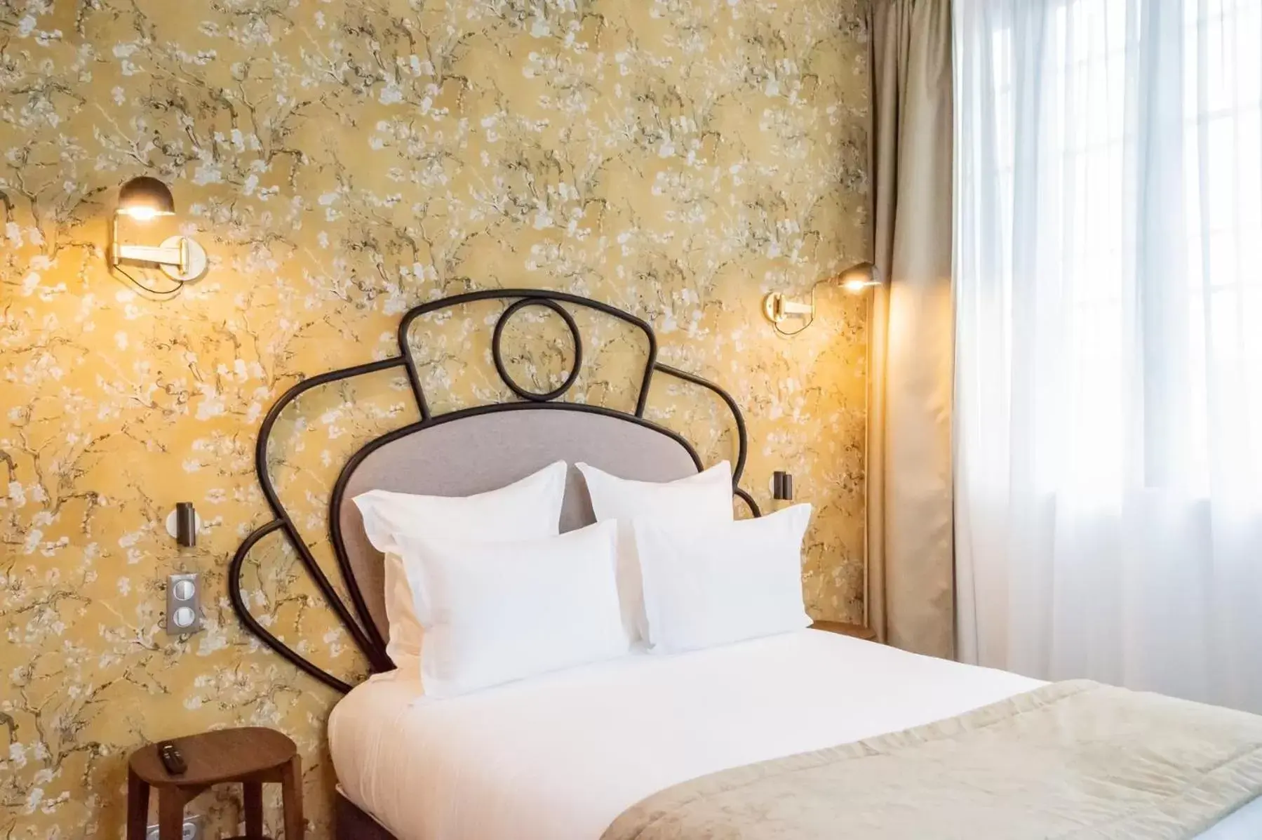 Bed in Hotel des Iris