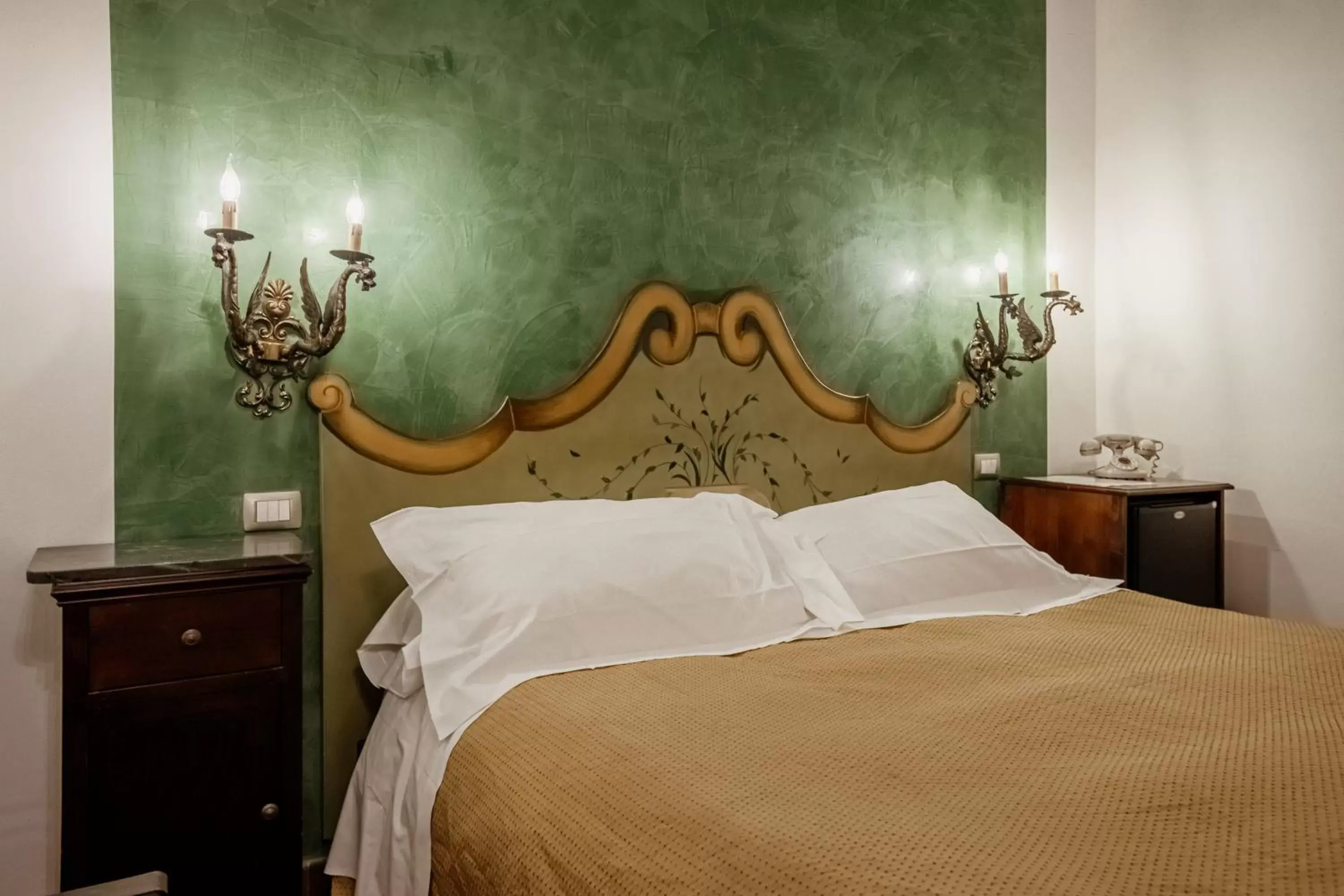 Decorative detail, Bed in Palazzo Giunta - Porta Marina Ortigia