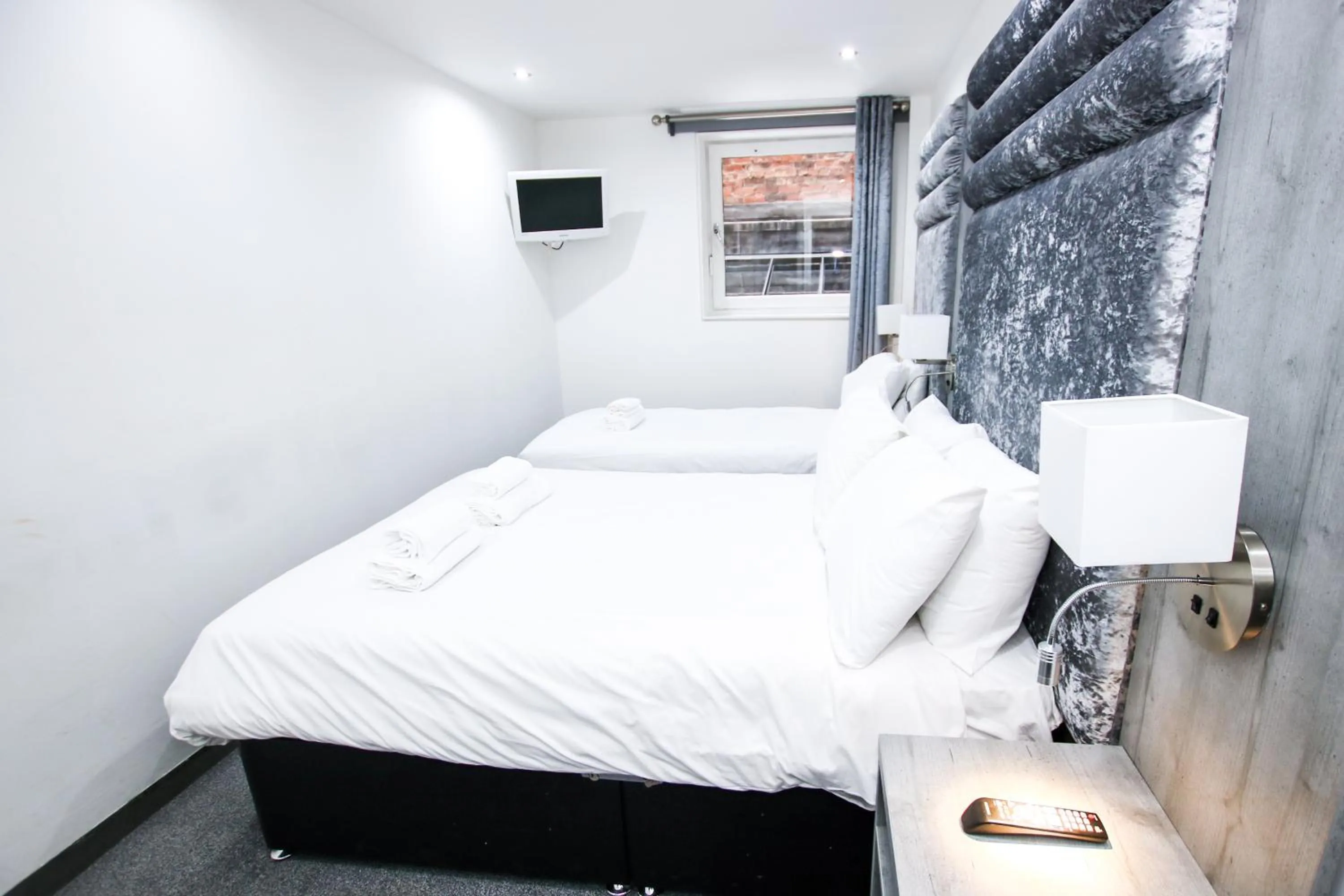 Bed in Brunswick Merchant City Hotel