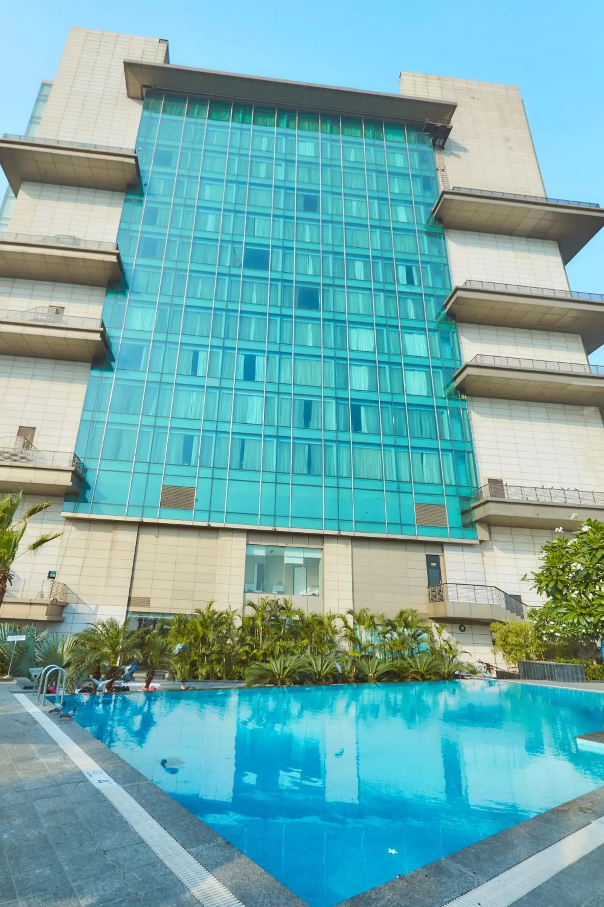 Swimming pool, Property Building in Crowne Plaza New Delhi Rohini, an IHG Hotel