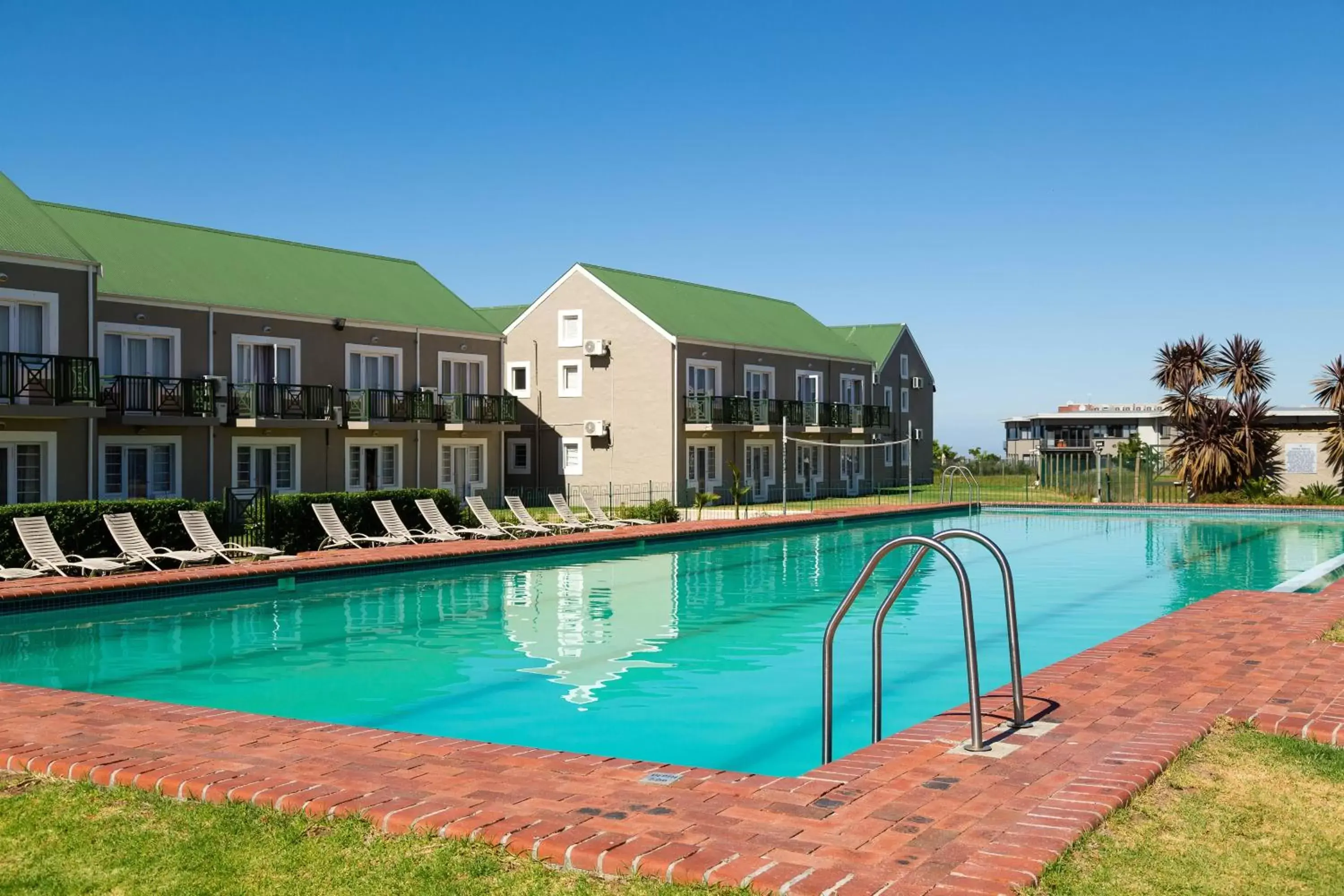 Swimming pool, Property Building in Protea Hotel by Marriott Stellenbosch & Conference Centre