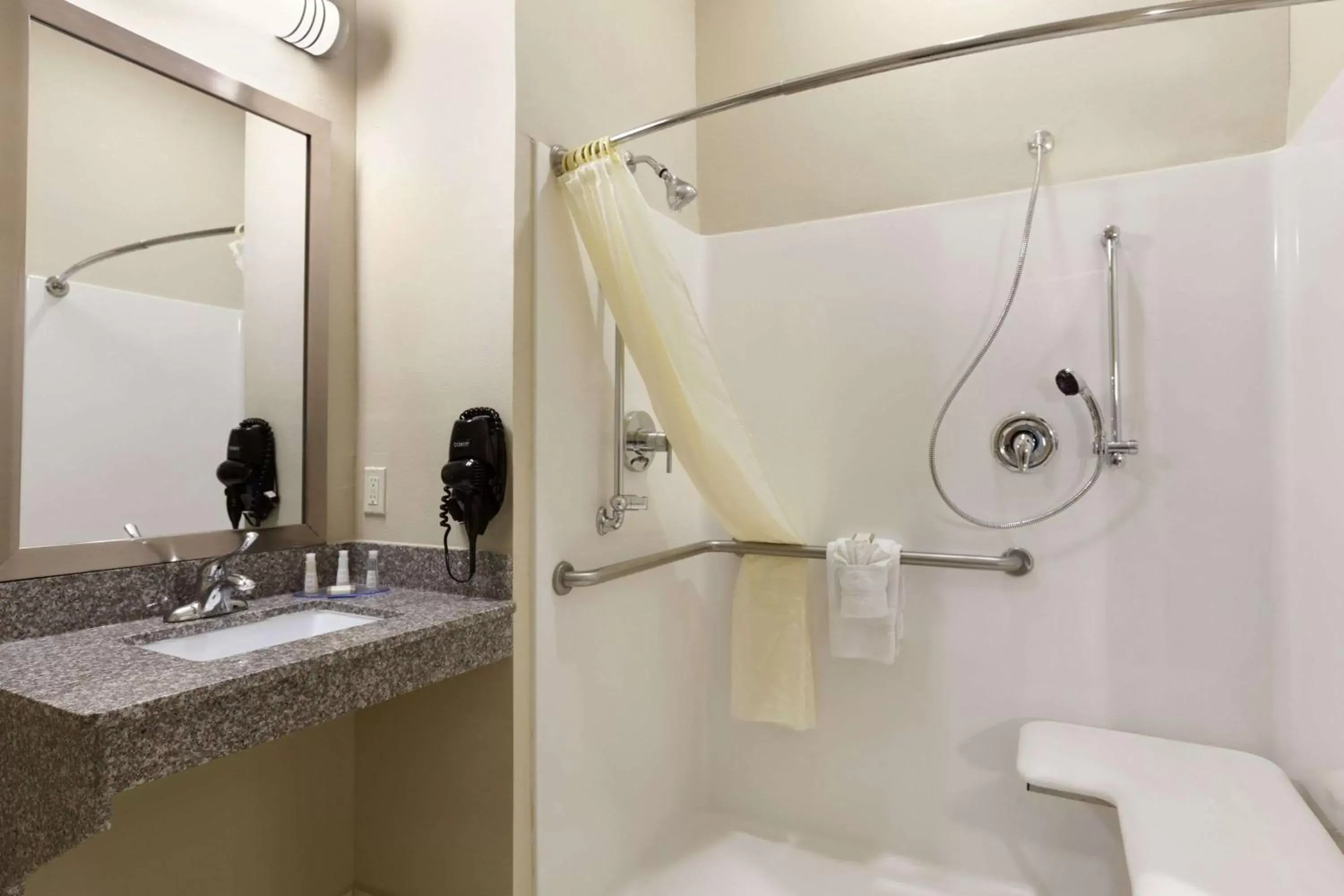 Bathroom in Baymont by Wyndham Victoria Bathroom in Baymont by Wyndham Victoria