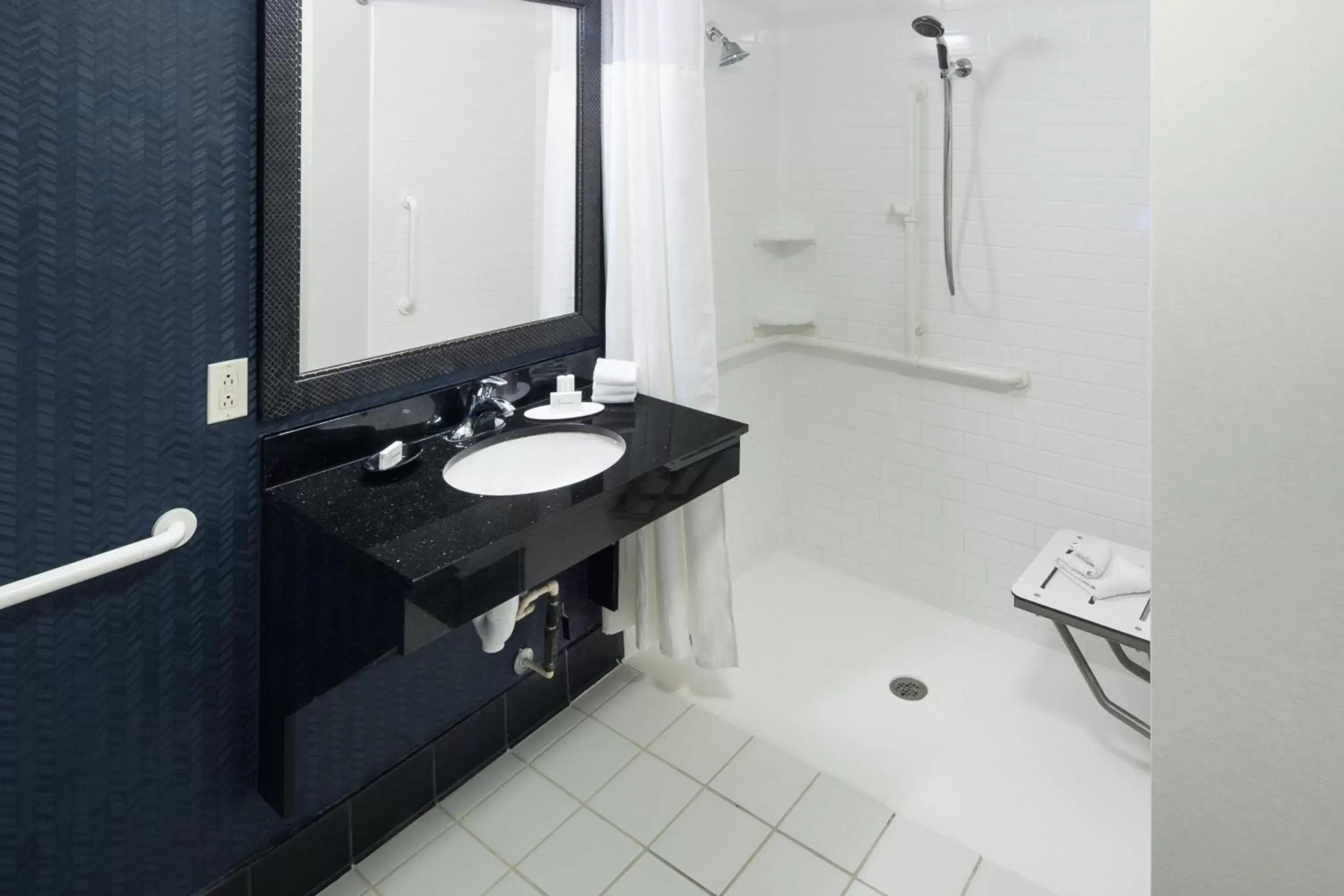 Bathroom in Fairfield Inn Suites by Marriott Orlando At SeaWorld