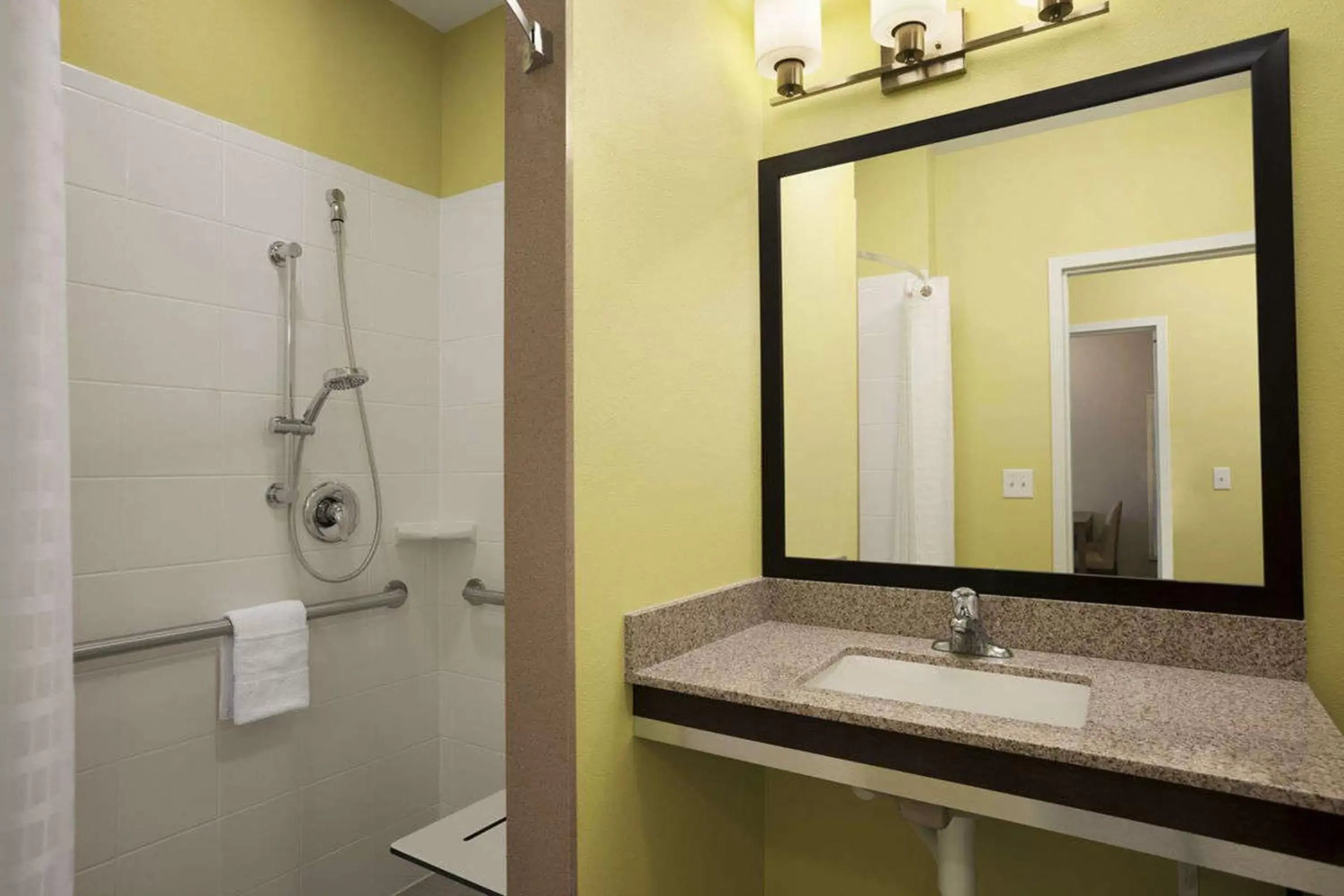 Bathroom in Days Inn & Suites by Wyndham Altoona