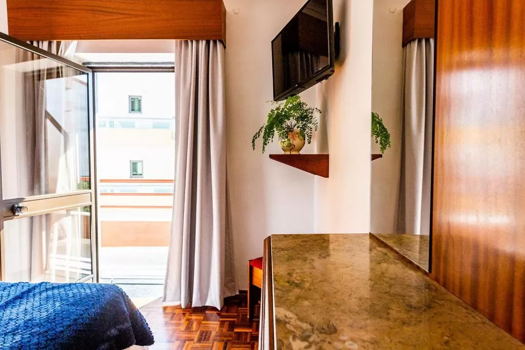 Balcony/Terrace, Bed in Dona Amélia Hotel by RIDAN Hotels