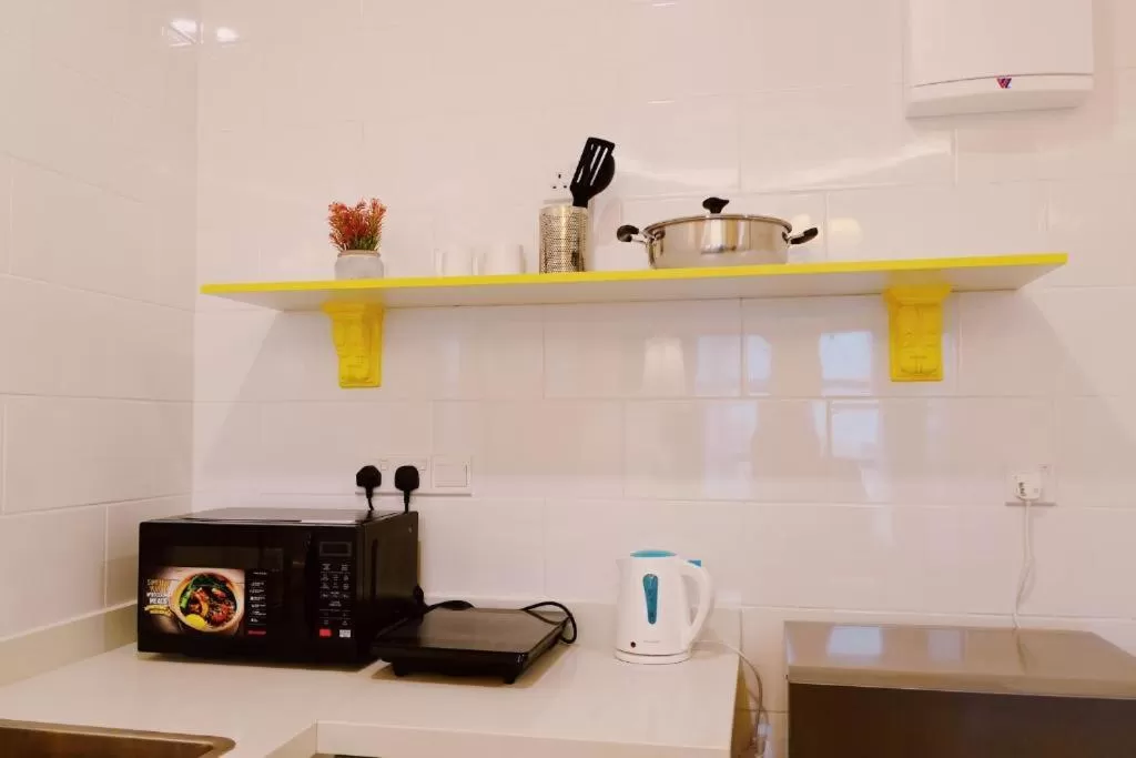 Kitchen or kitchenette in Arte Mont Kiara Hotel Suite