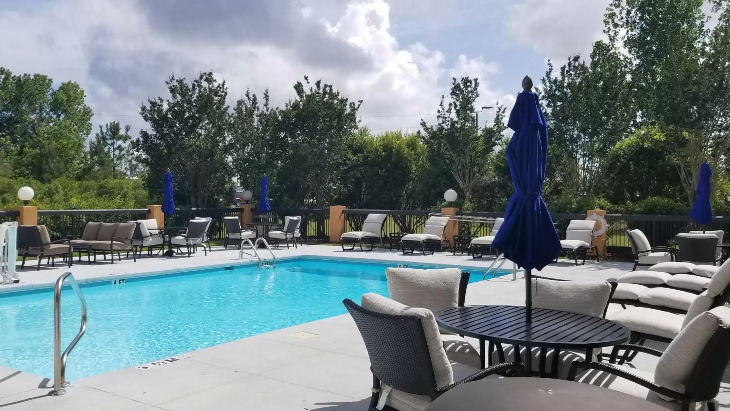Swimming Pool in Holiday Inn Express & Suites Wilmington-University Center, an IHG Hotel