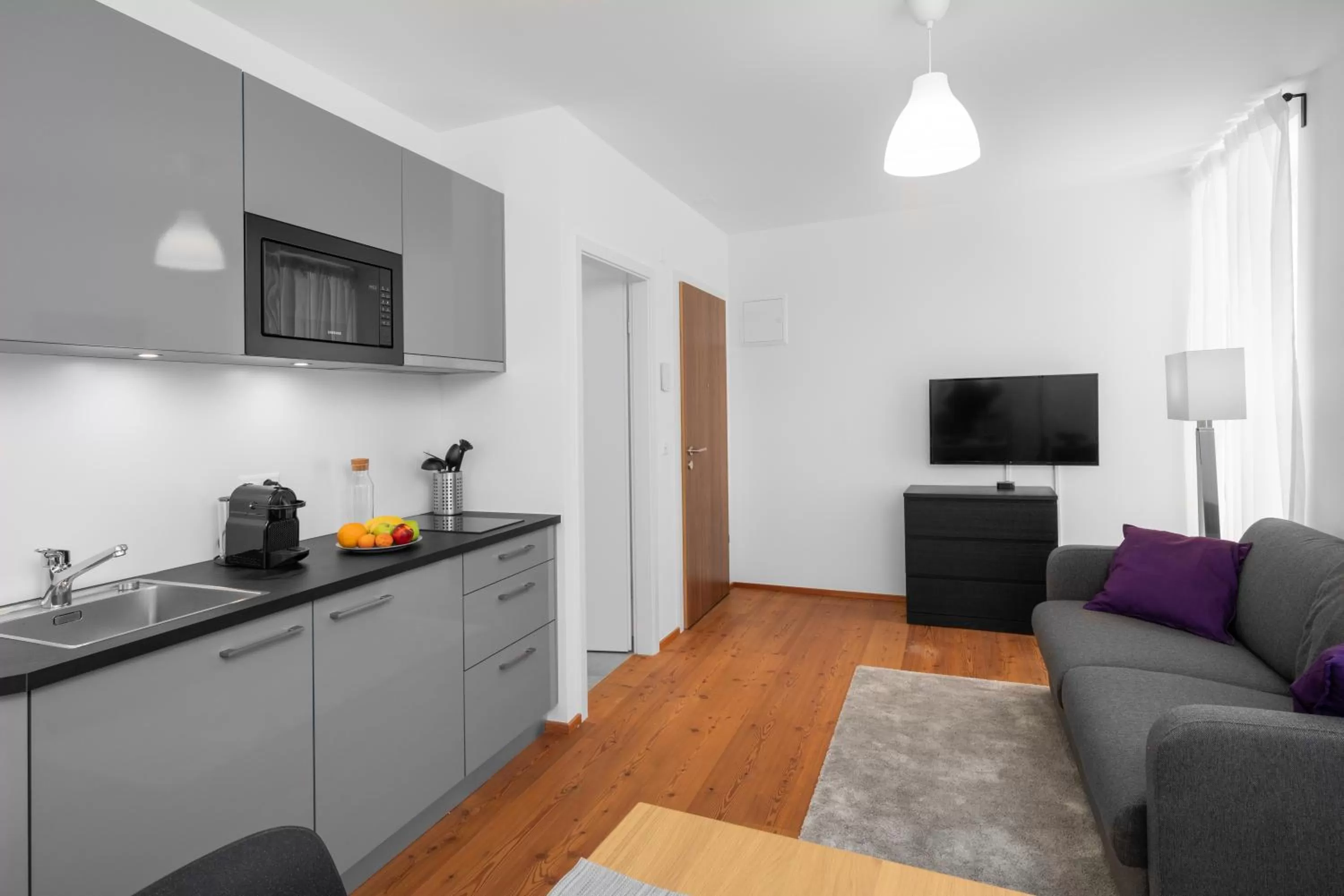 Kitchen or kitchenette in The Studios Montreux - Swiss Hotel Apartments