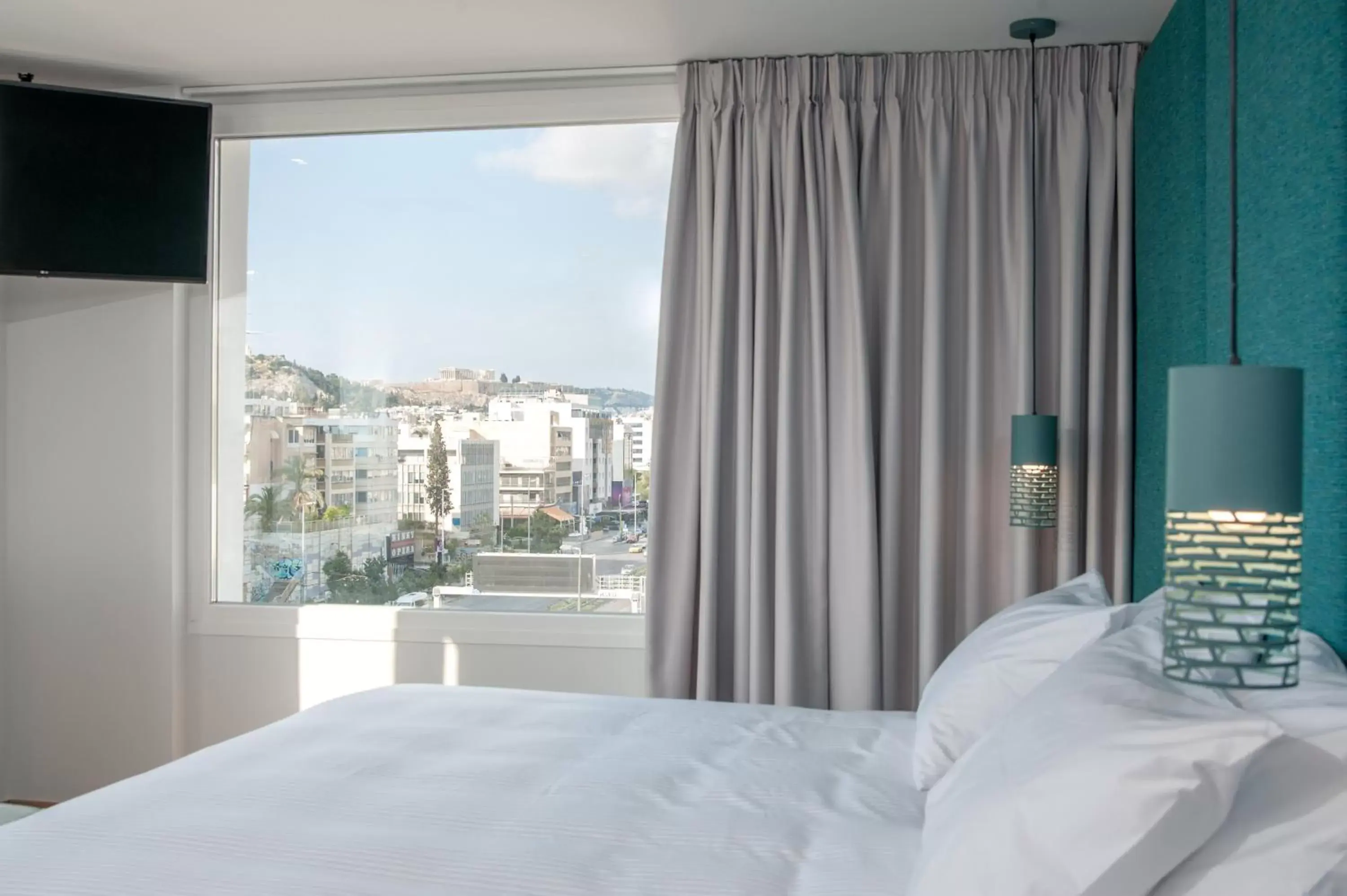 Bed in Athenaeum Smart Hotel