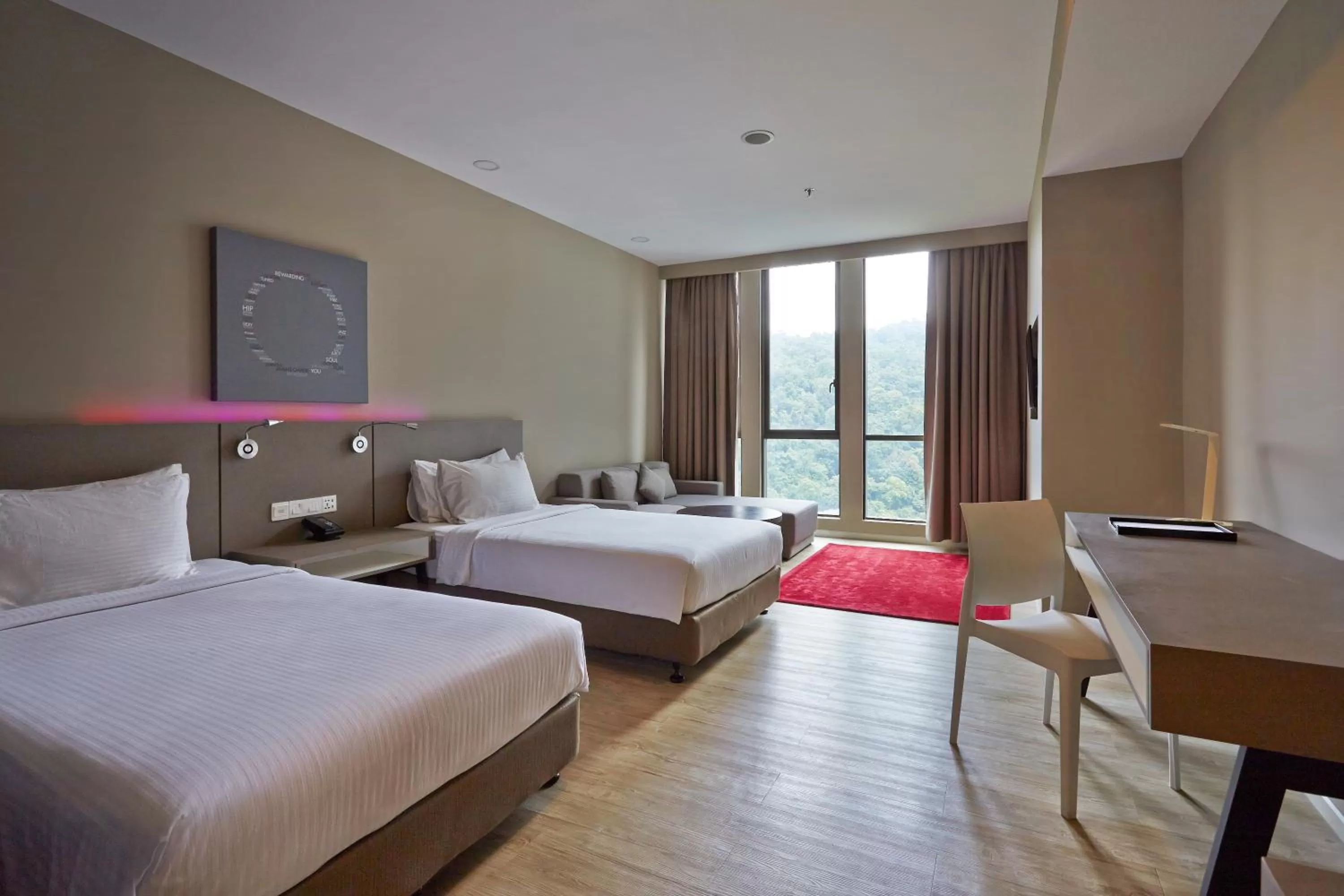 Bed in Qliq Damansara Hotel