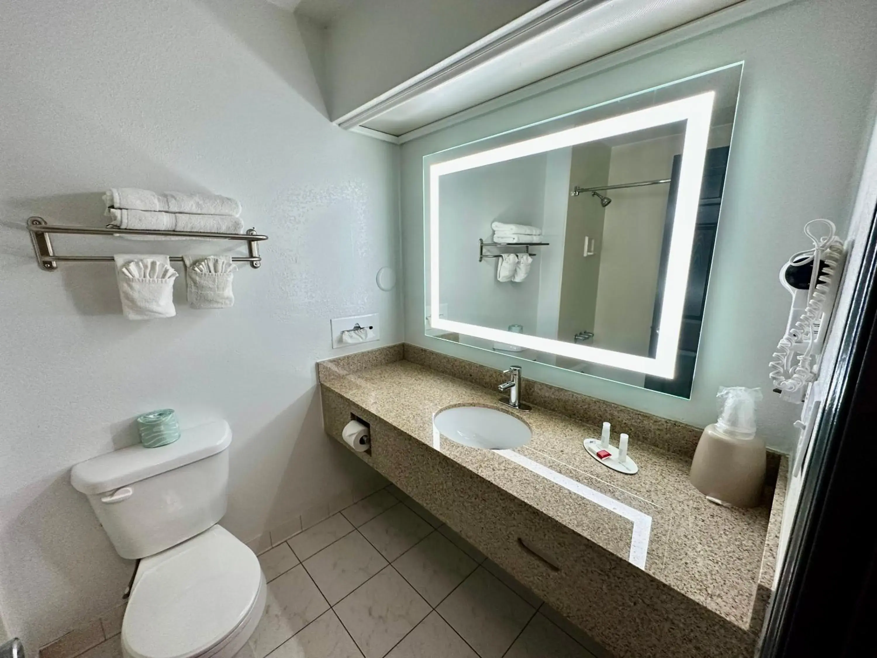 Bathroom in Baymont by Wyndham Kansas City KU Medical Center