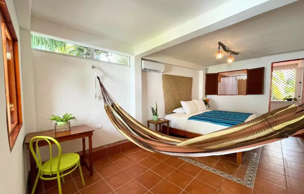 Bed in Hotel Villas Colibrí Suites & Bungalows