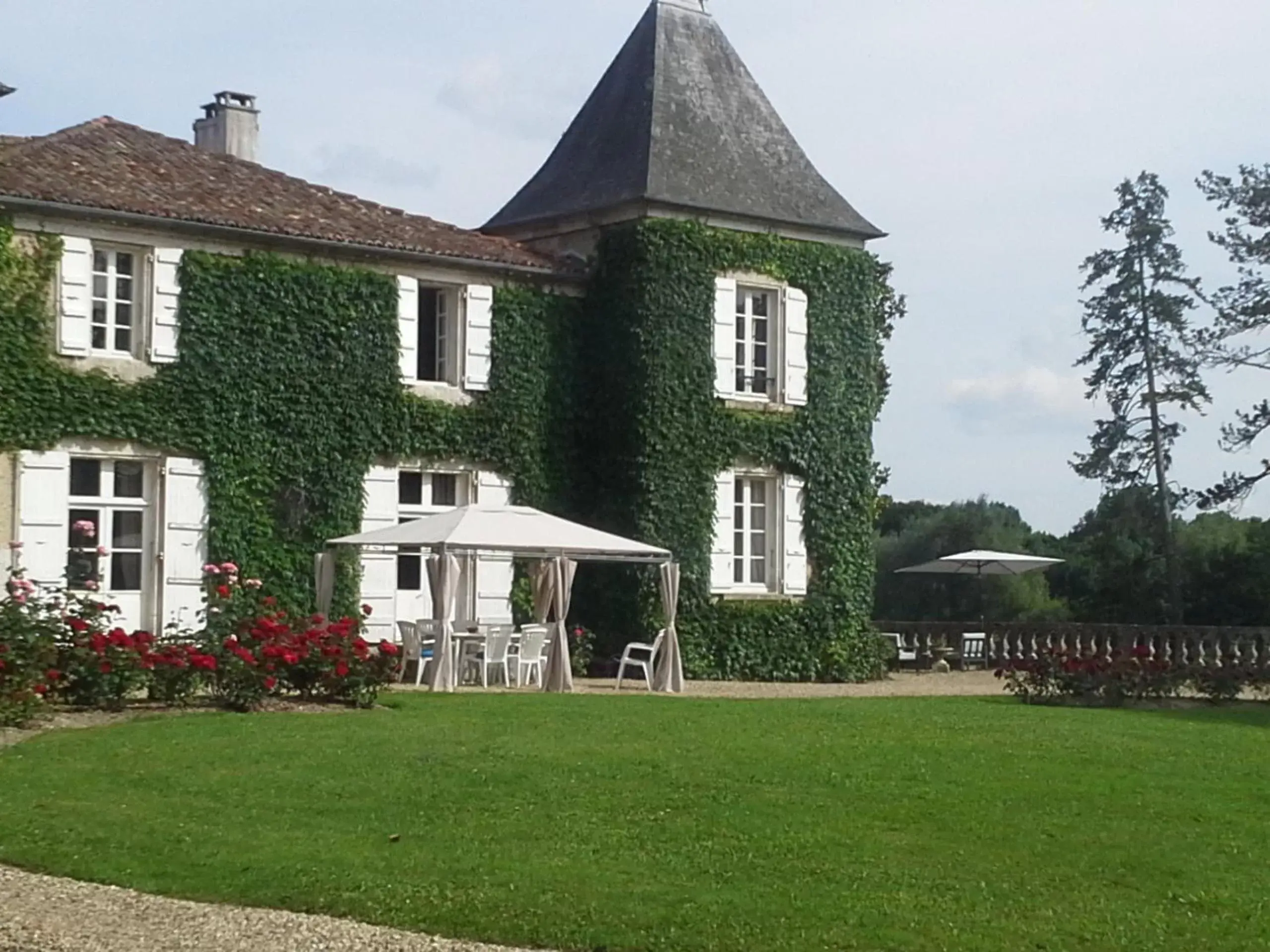 Facade/entrance, Garden in Le Logis De Ruelle