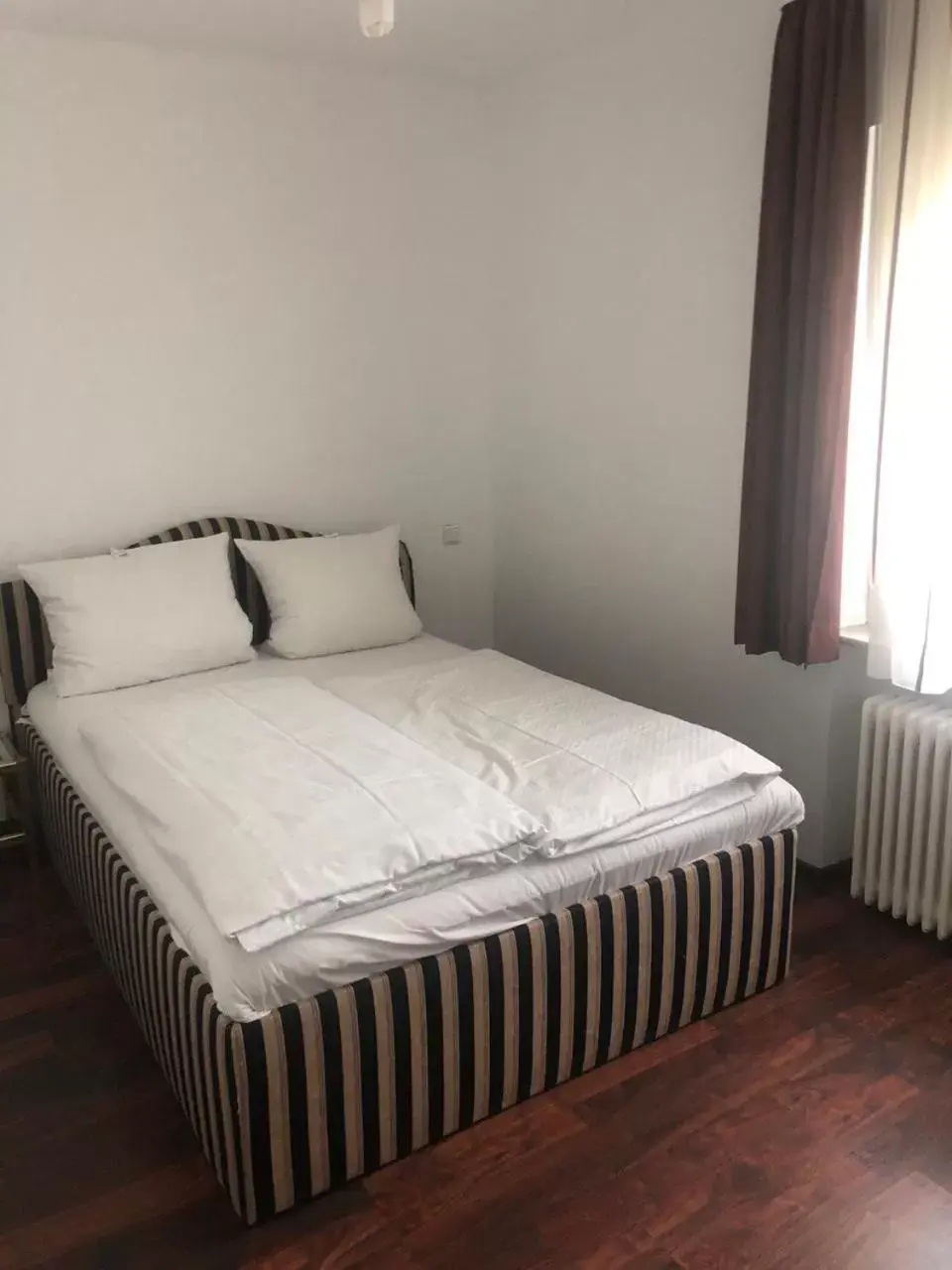 Bed in Eisberg Hotel City