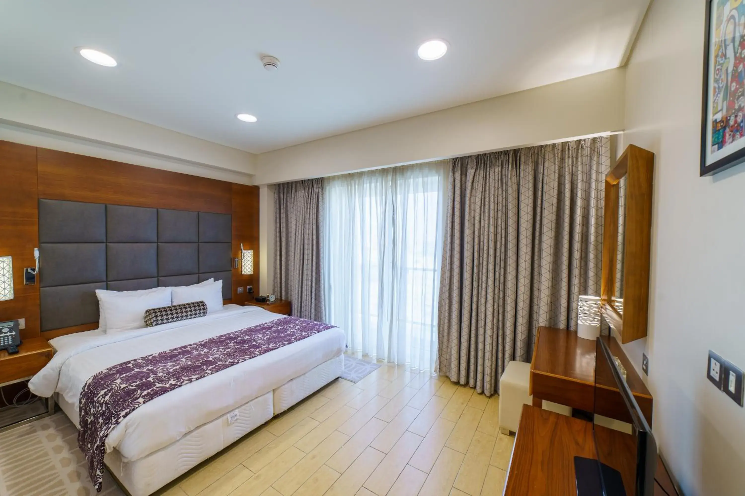 Bed in Levatio Suites Muscat, a member of Radisson Individuals