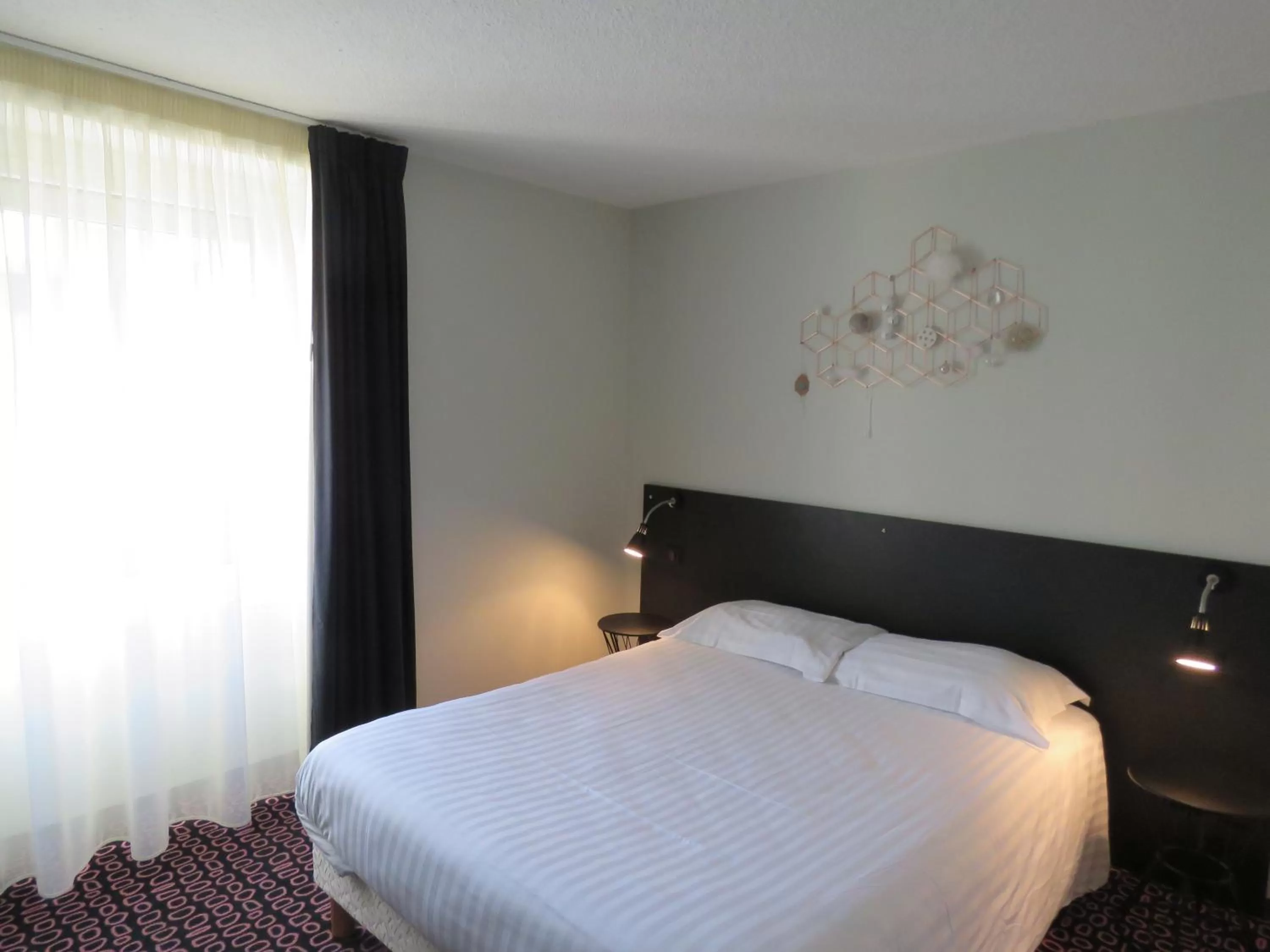 Photo of the whole room, Bed in Dav'hotel Jaude