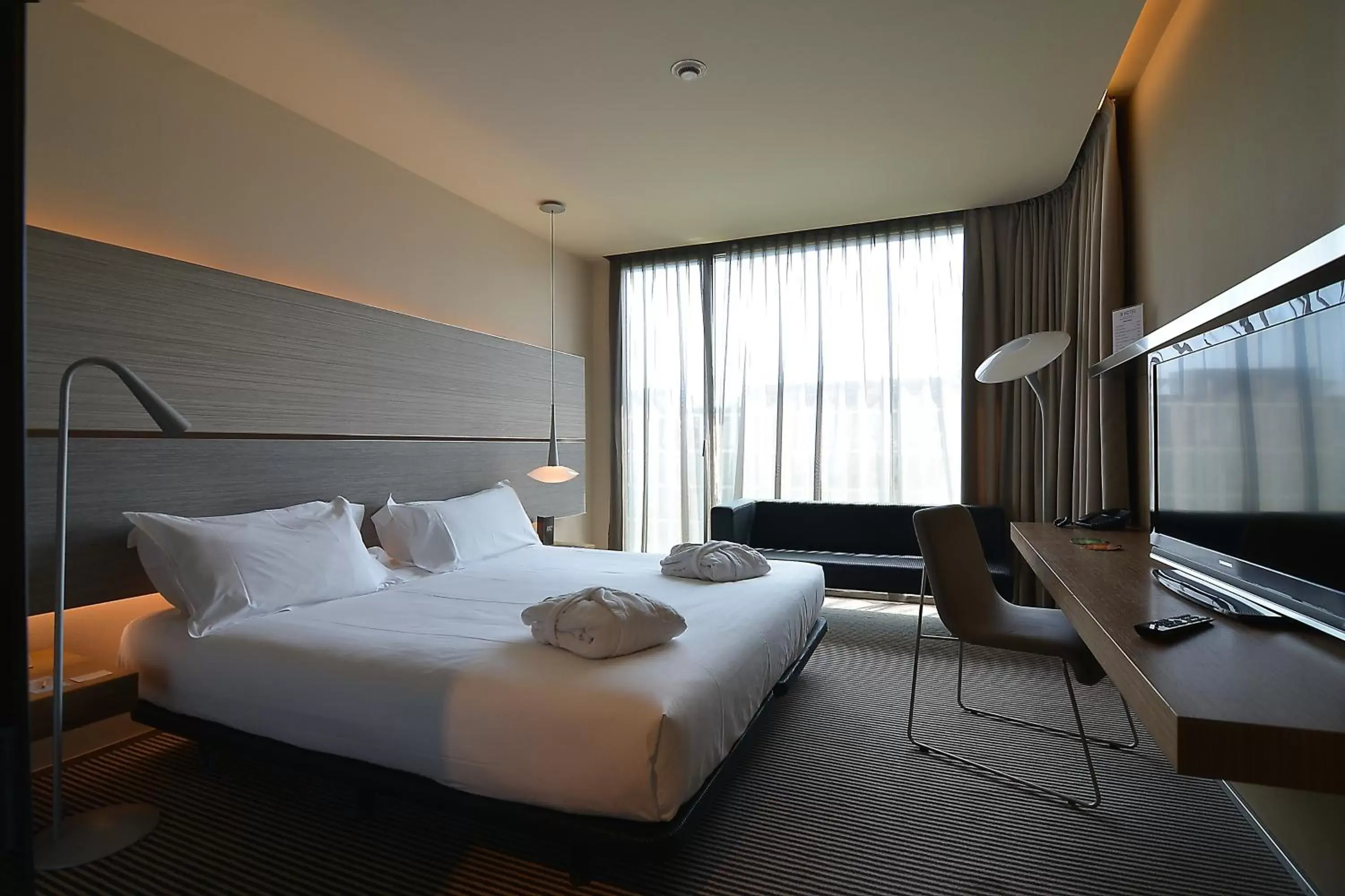Photo of the whole room, Bed in B Hotel