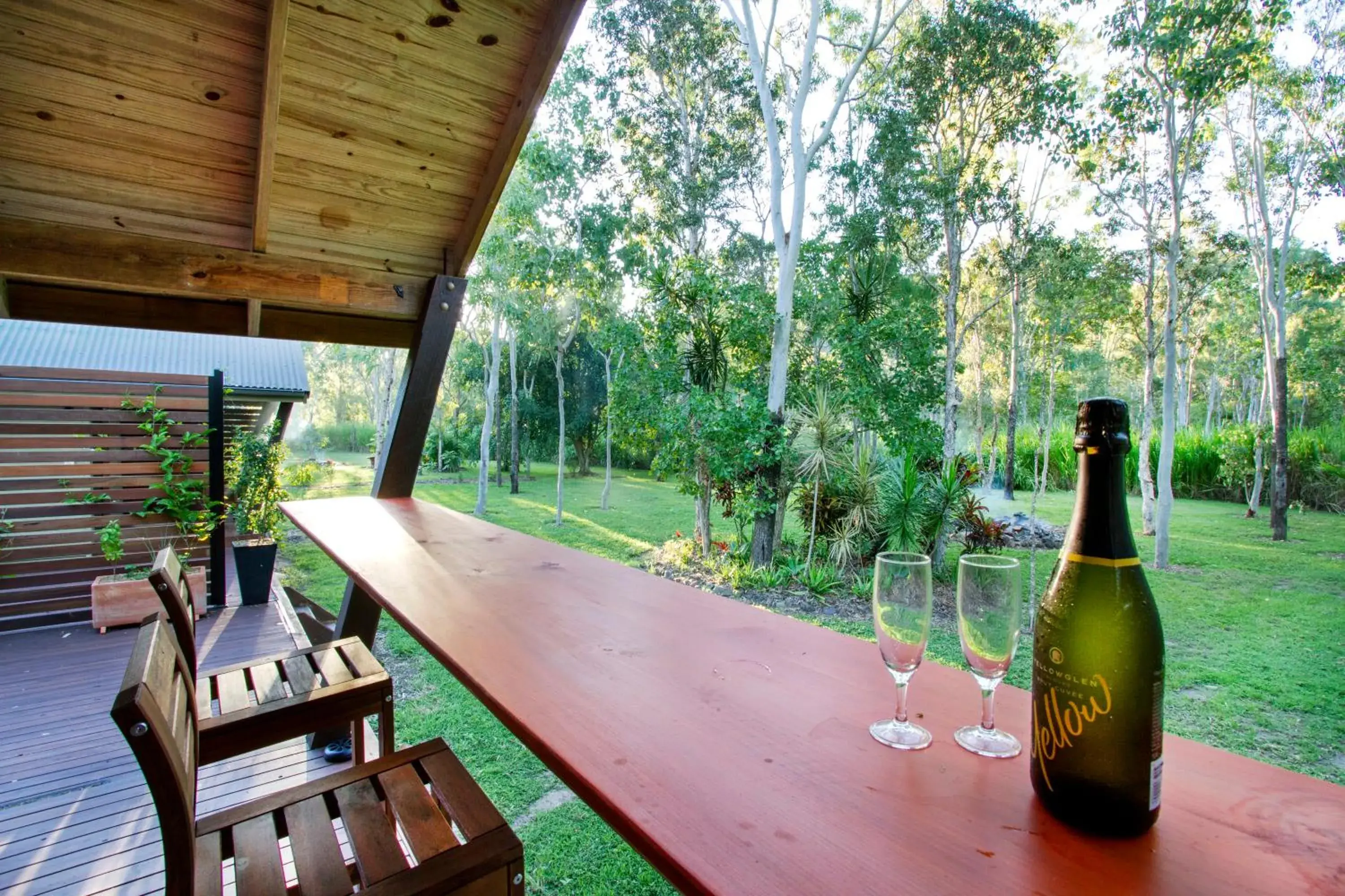 Garden view, Balcony/Terrace in Airlie Beach Eco Cabins - Adults Only