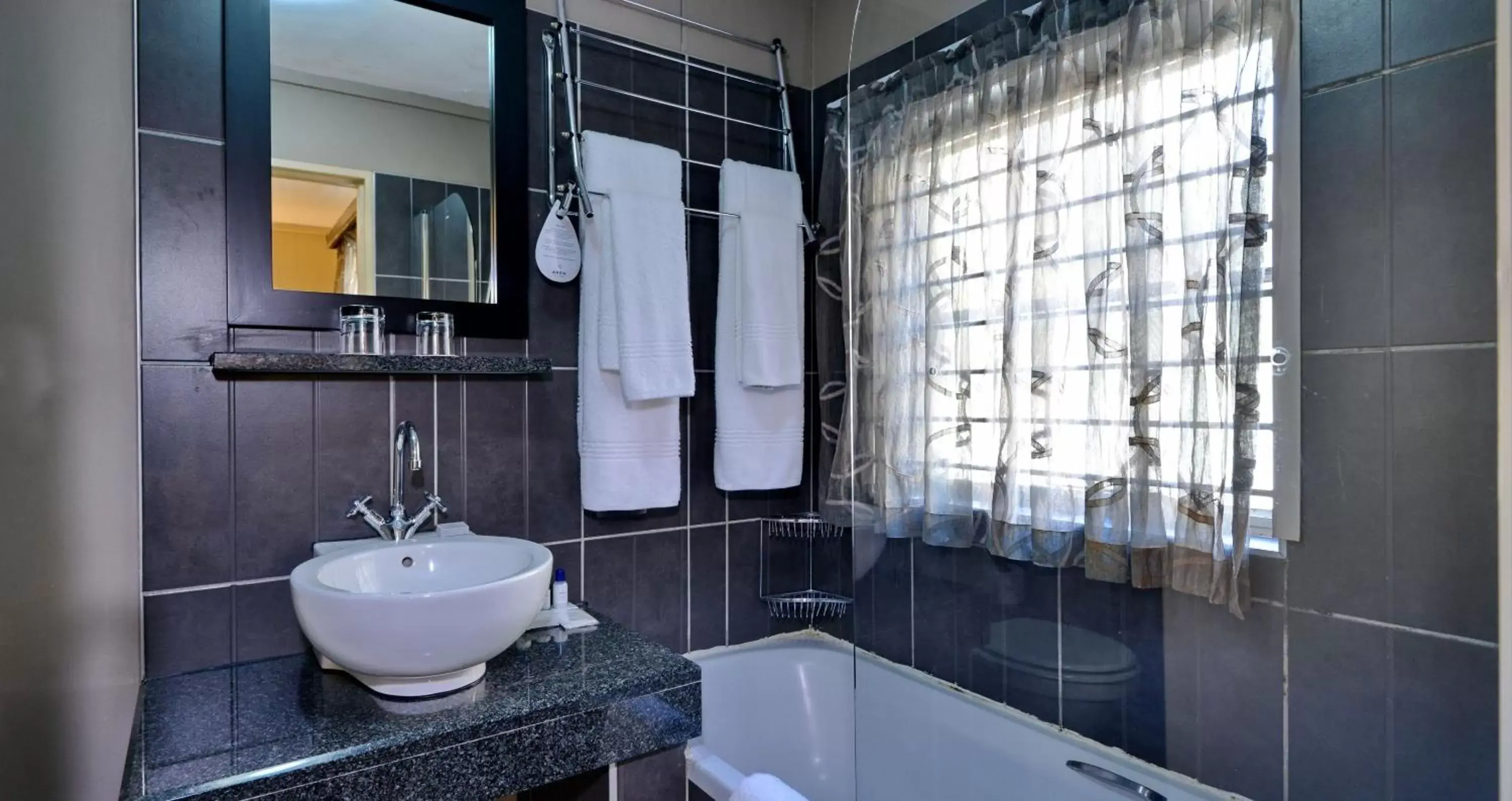 Bathroom in ANEW Hotel Hatfield Pretoria