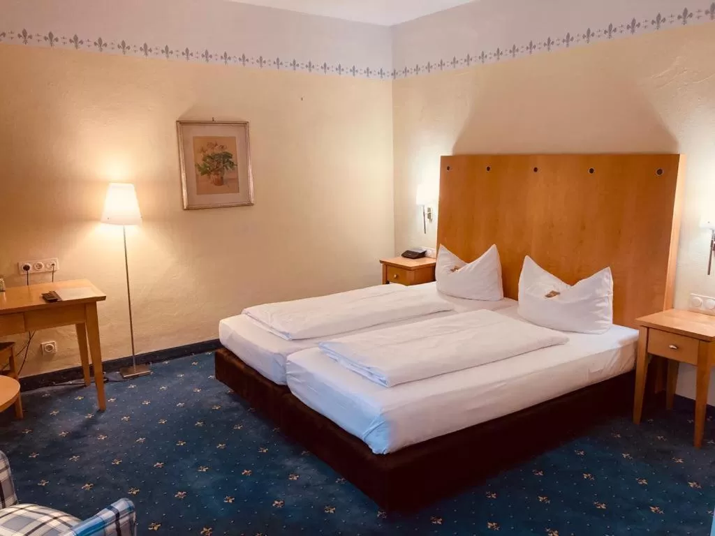 Bed in Hotel Rosenheimer Hof