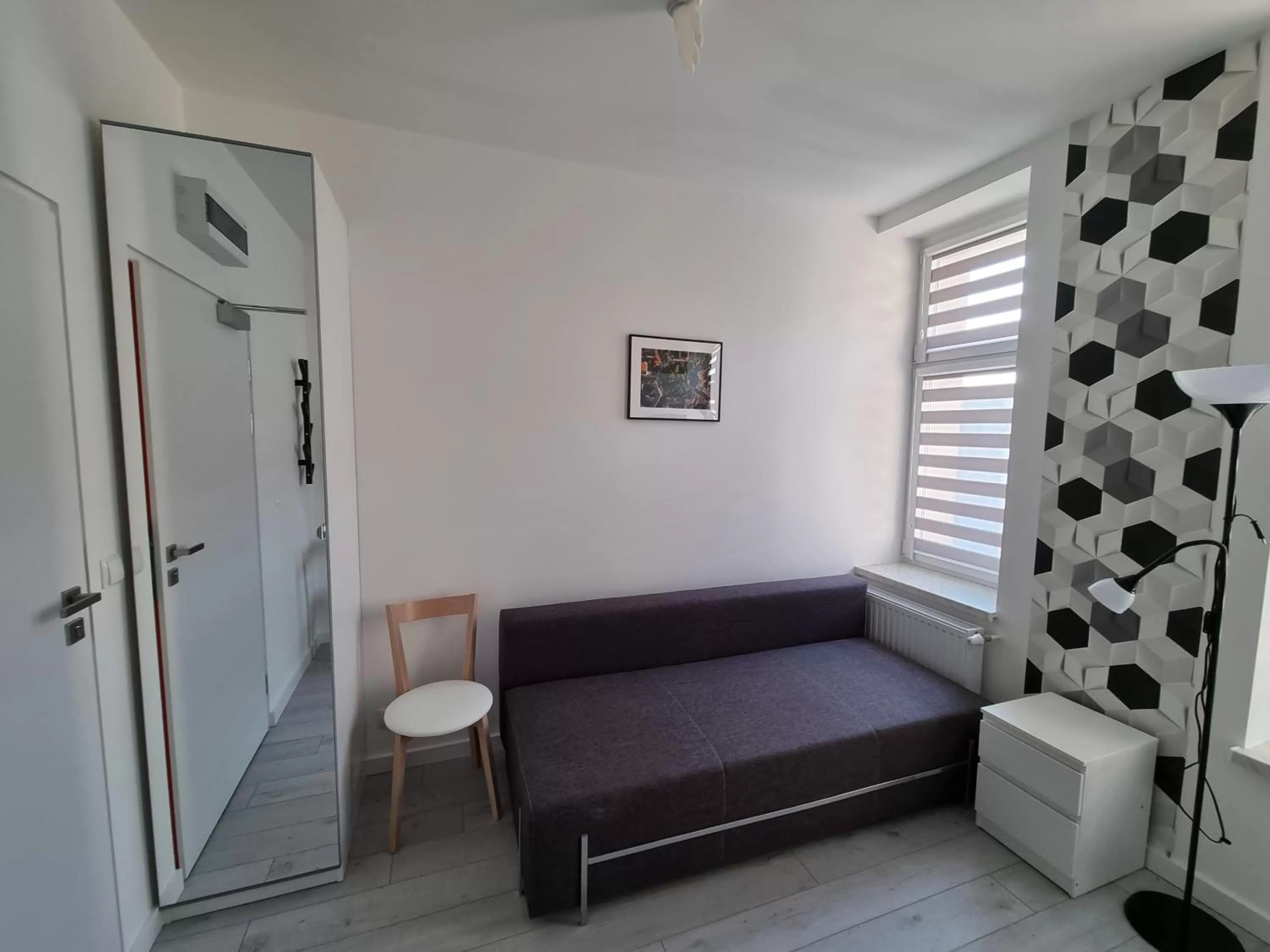 Bed, Seating Area in Apartamenty Katowice Stawowa 5