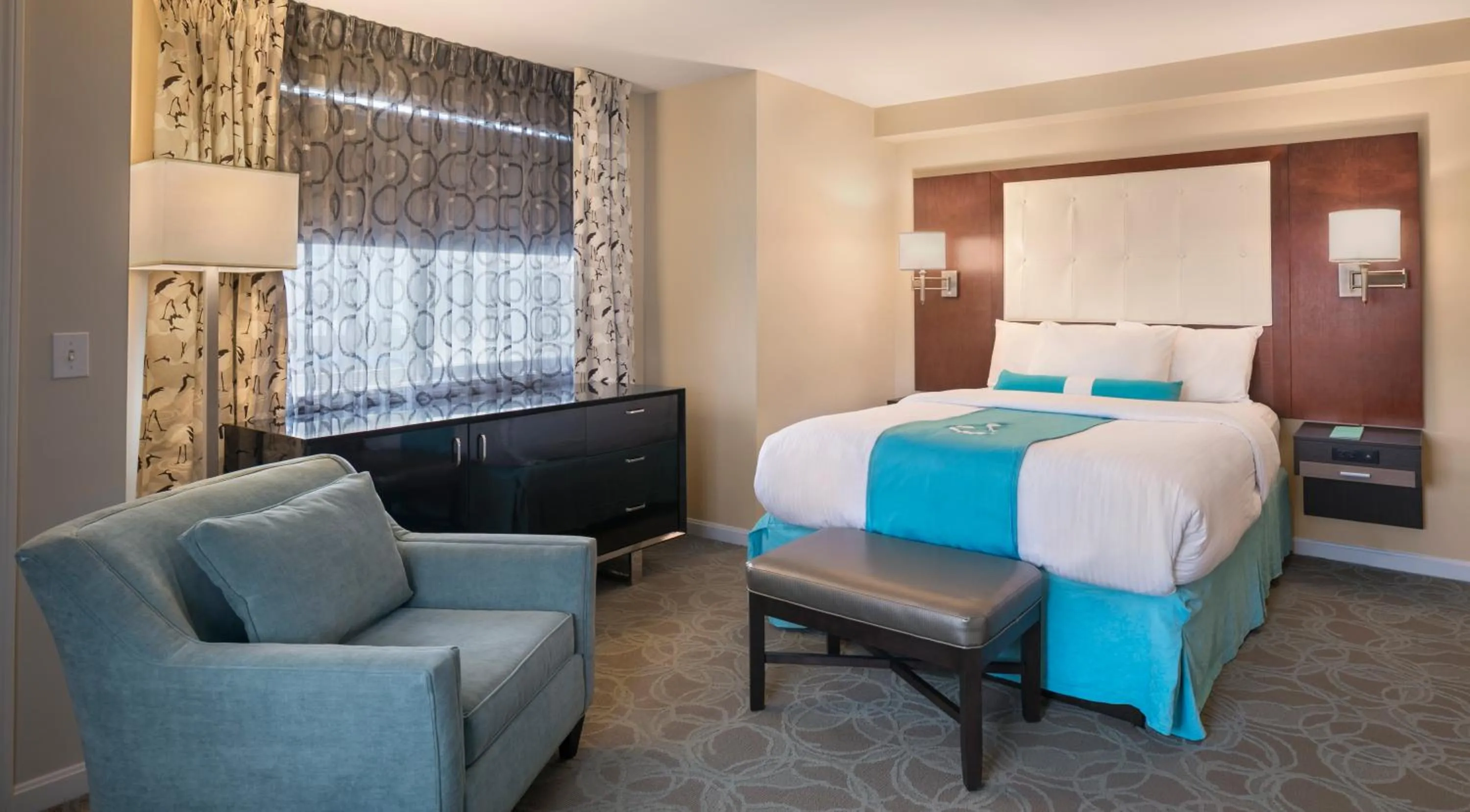 Bed in Aqua Blue Hotel