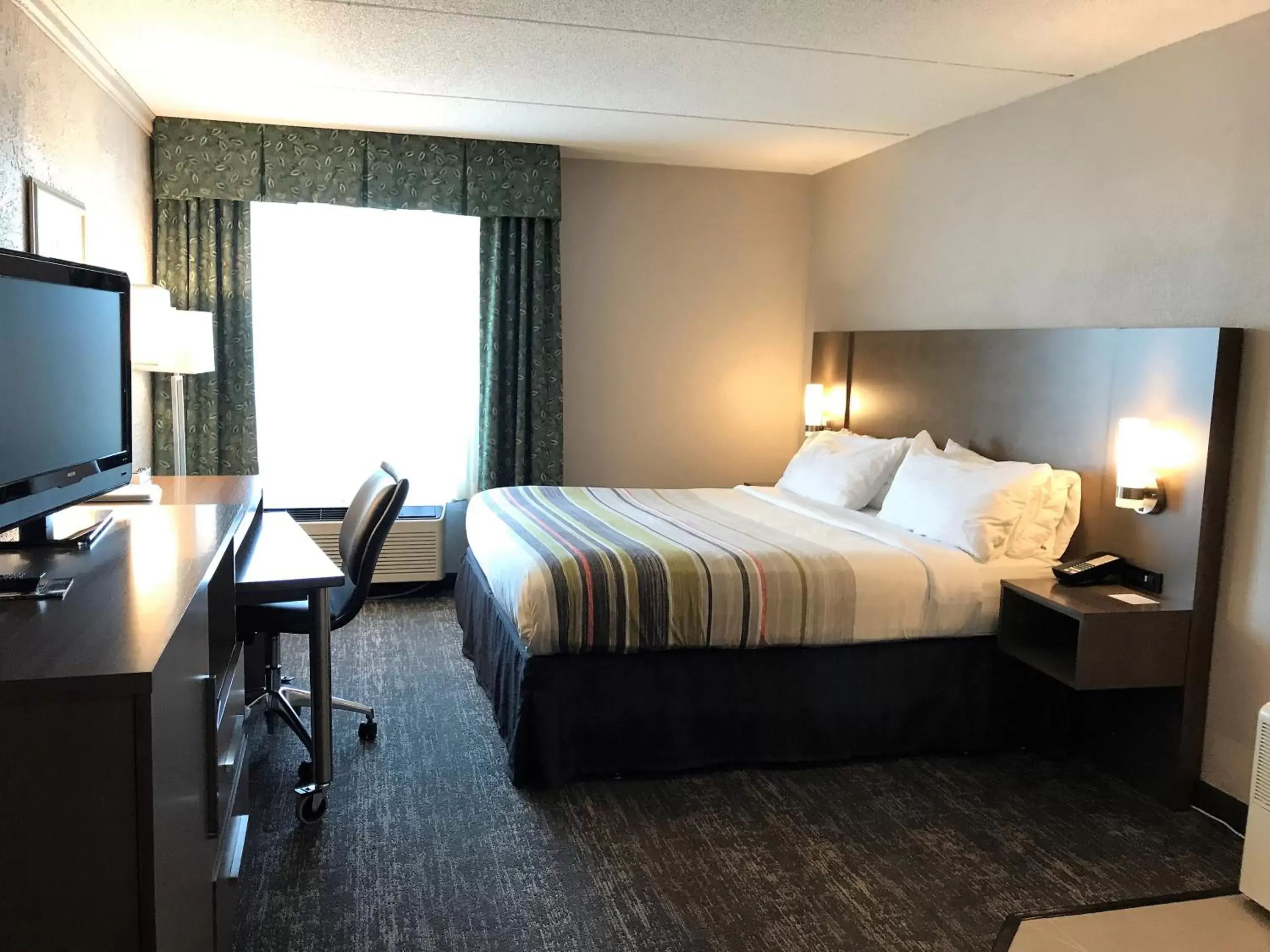 Bed in Country Inn & Suites by Radisson, Mt. Pleasant-Racine West, WI