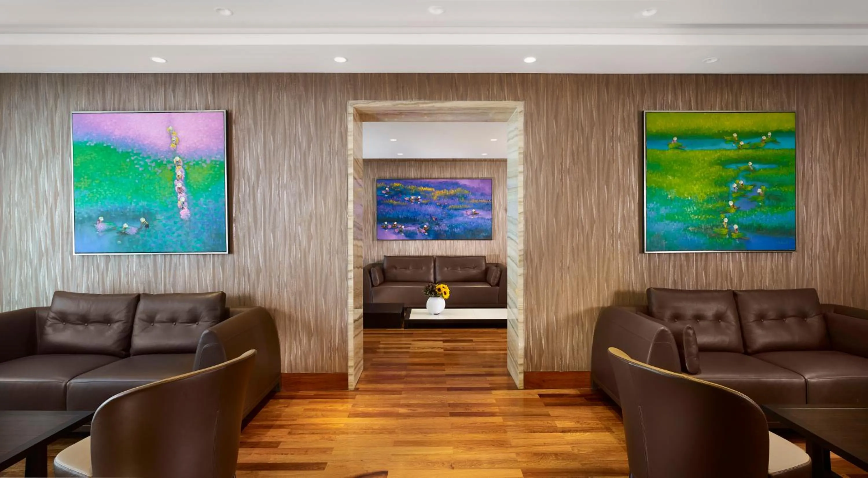 Communal lounge/ TV room in The Reverie Saigon Residential Suites