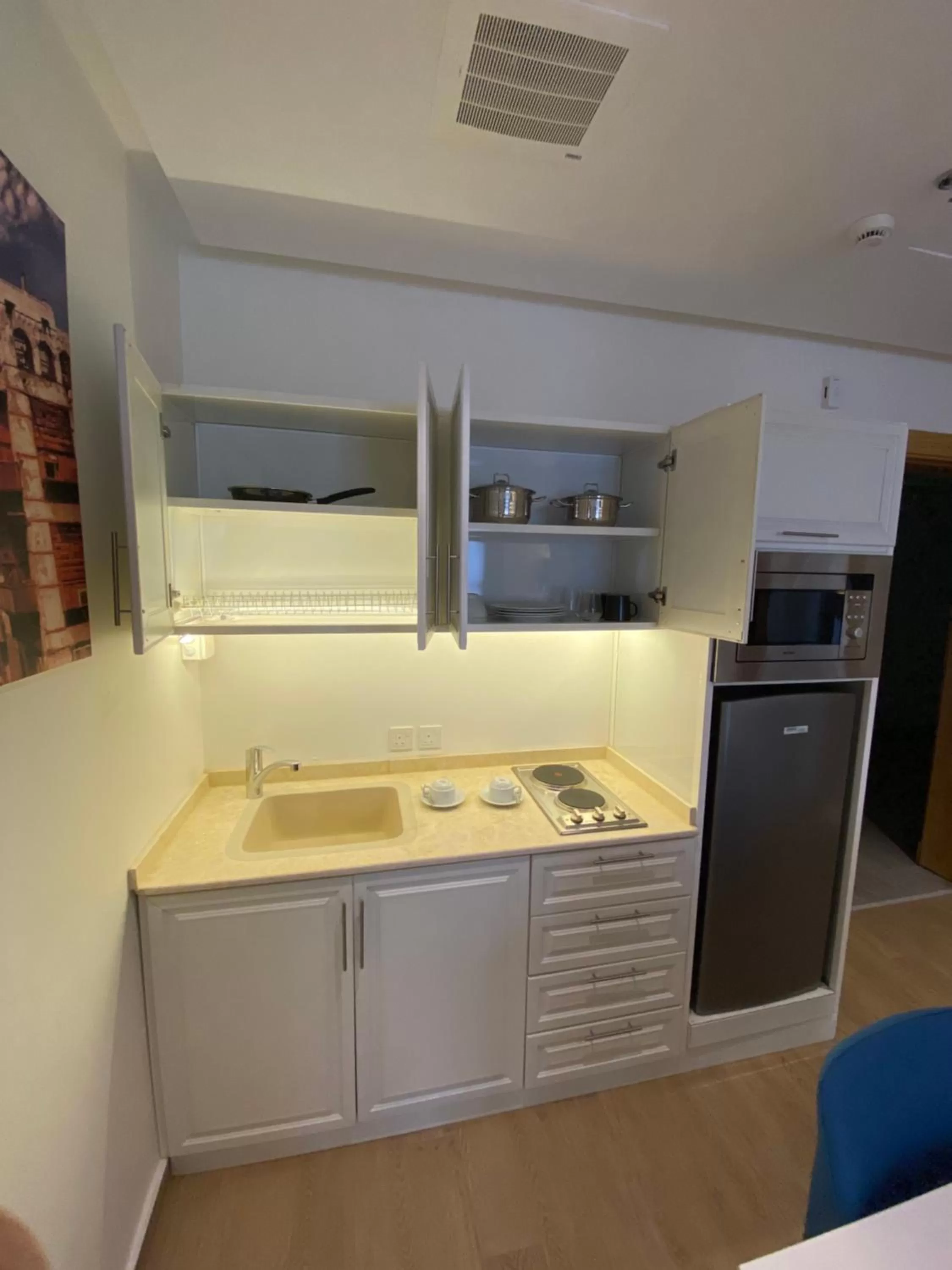 Kitchen or kitchenette in Hasanah suites