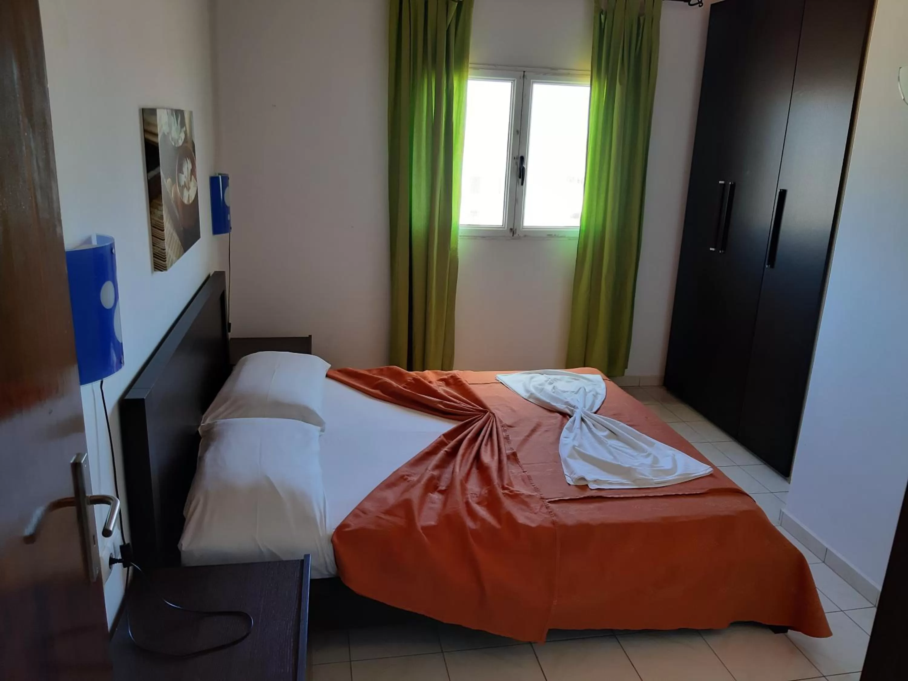 Bed in Aparthotel Ponta Preta