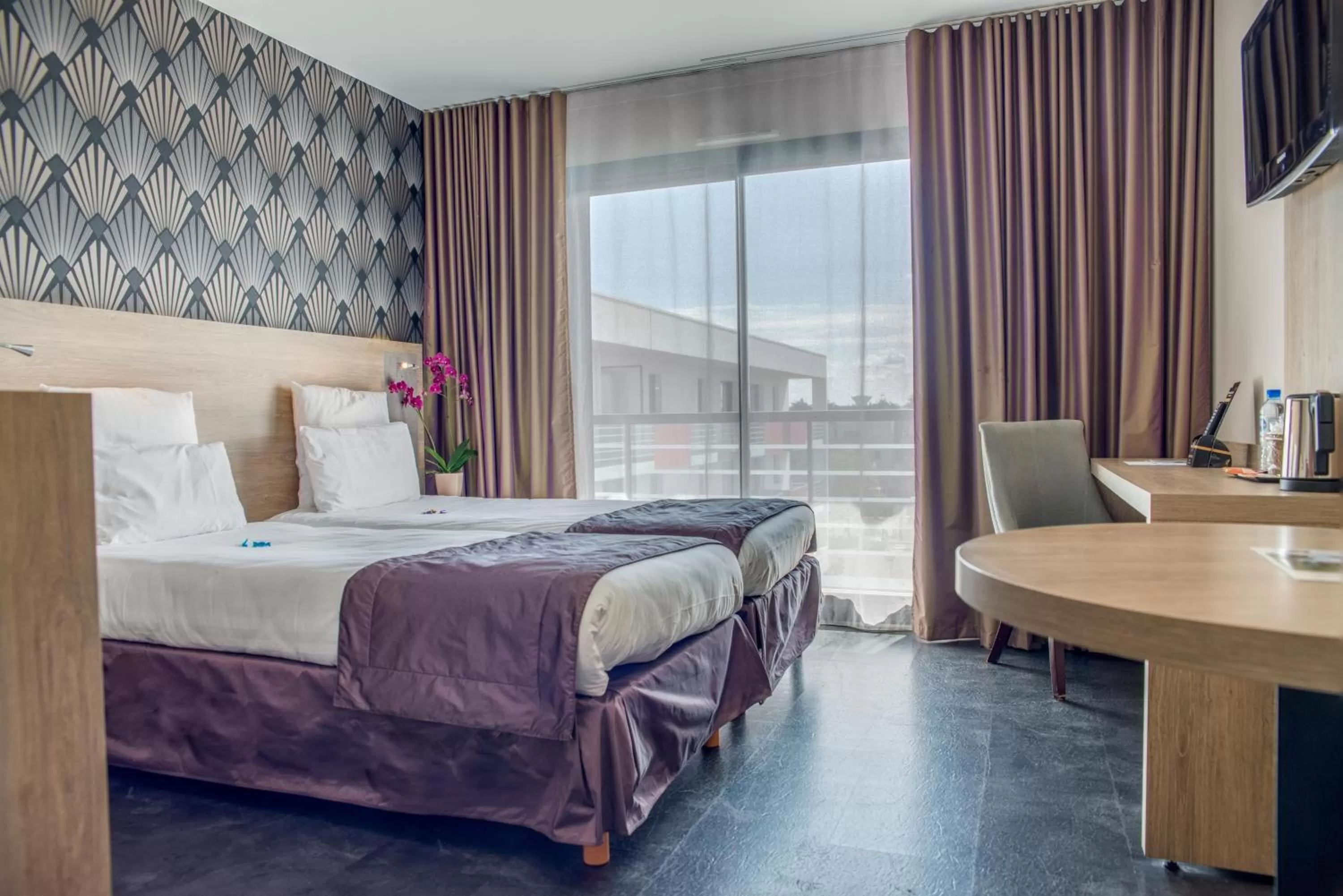 Photo of the whole room, Bed in Best Western Les Aureliades Saint Nazaire