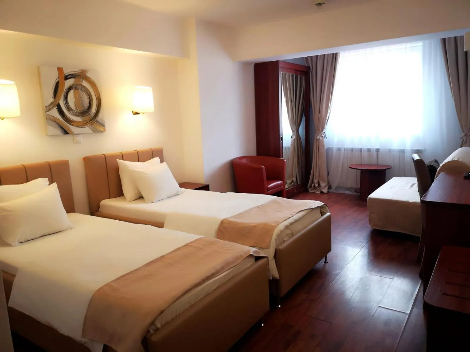 Bed in Atrium Hotel Bucharest City Center