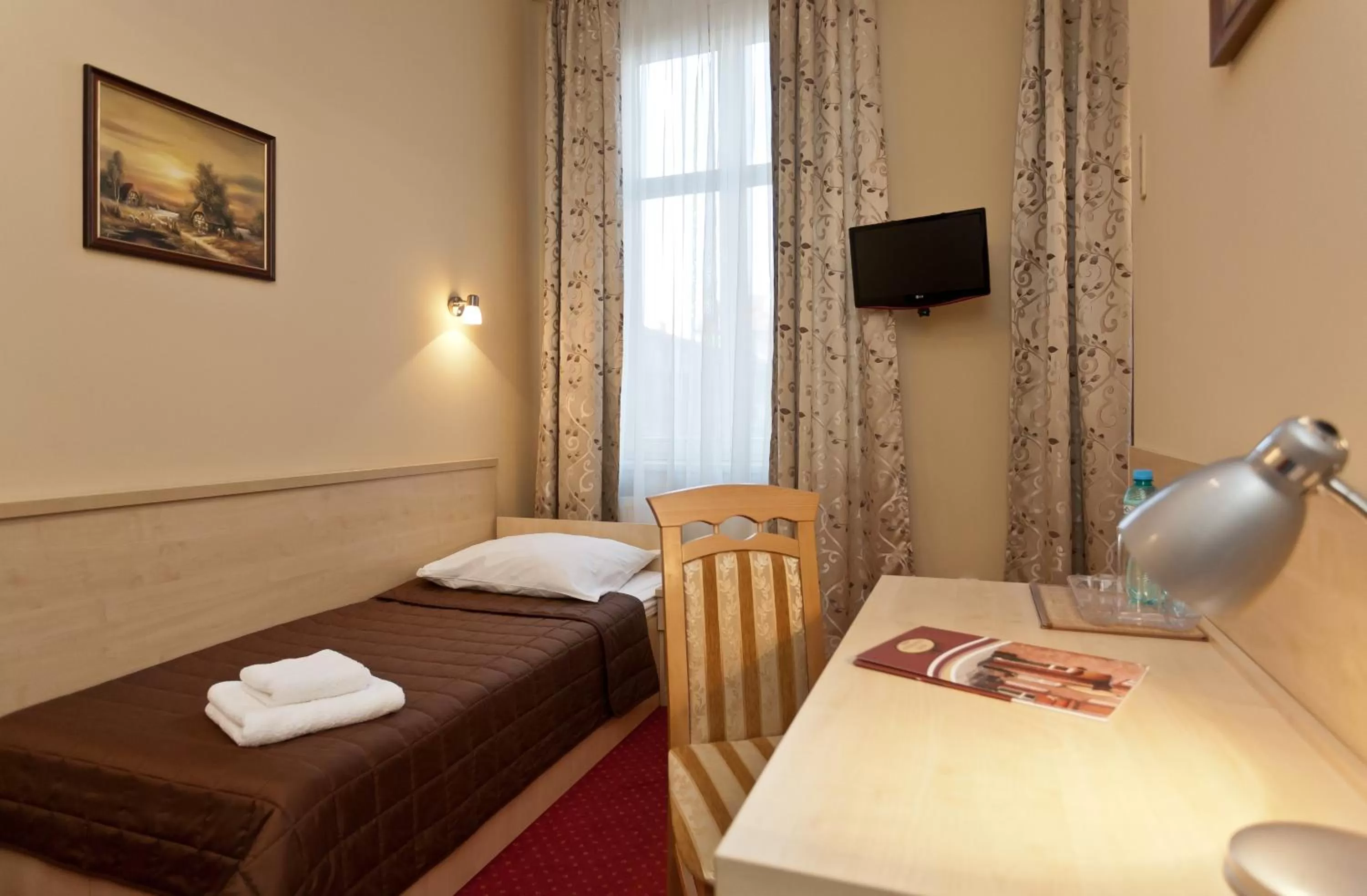 Bed in Hotel Maksymilian