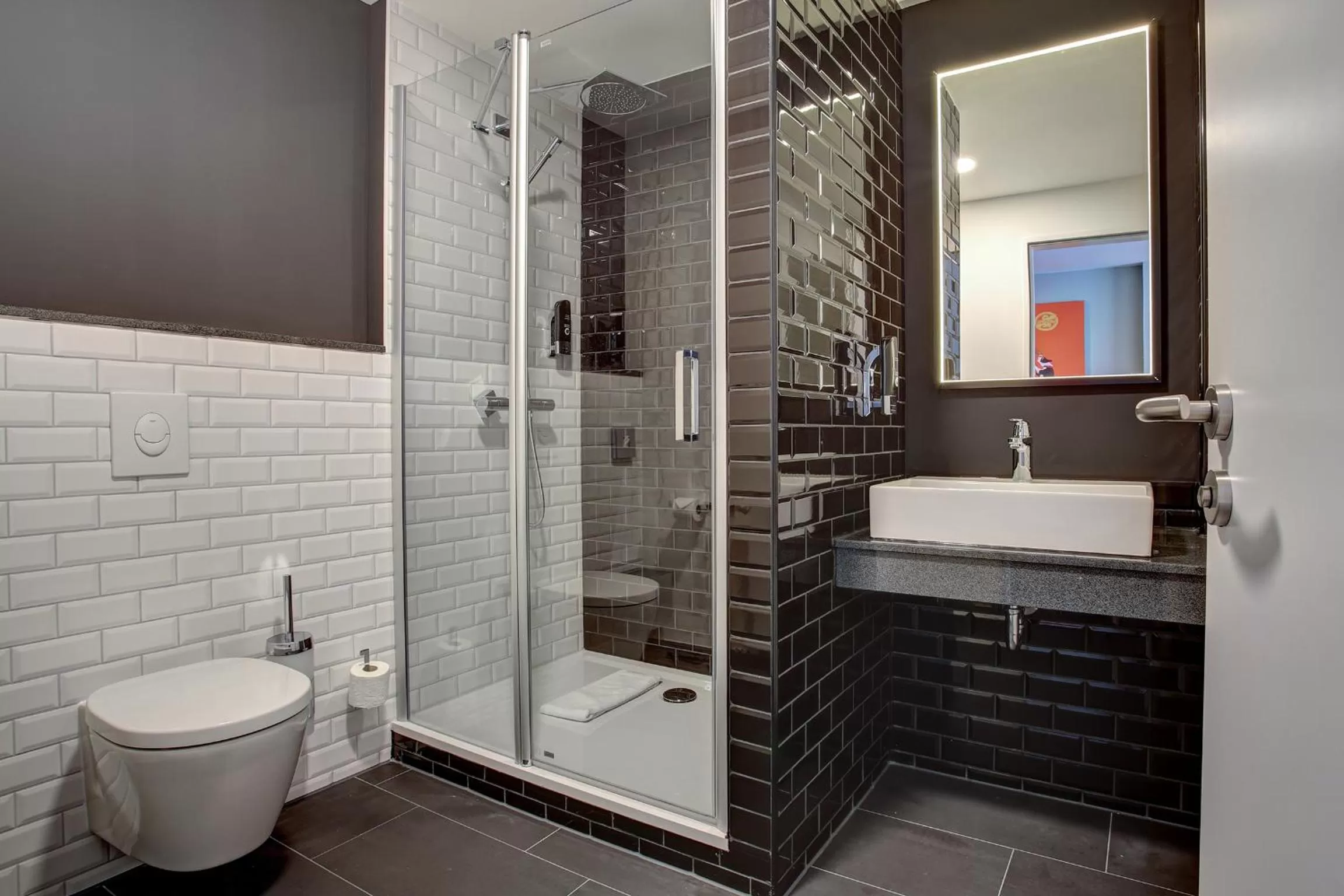 Bathroom in Vienna House Easy by Wyndham Dortmund City