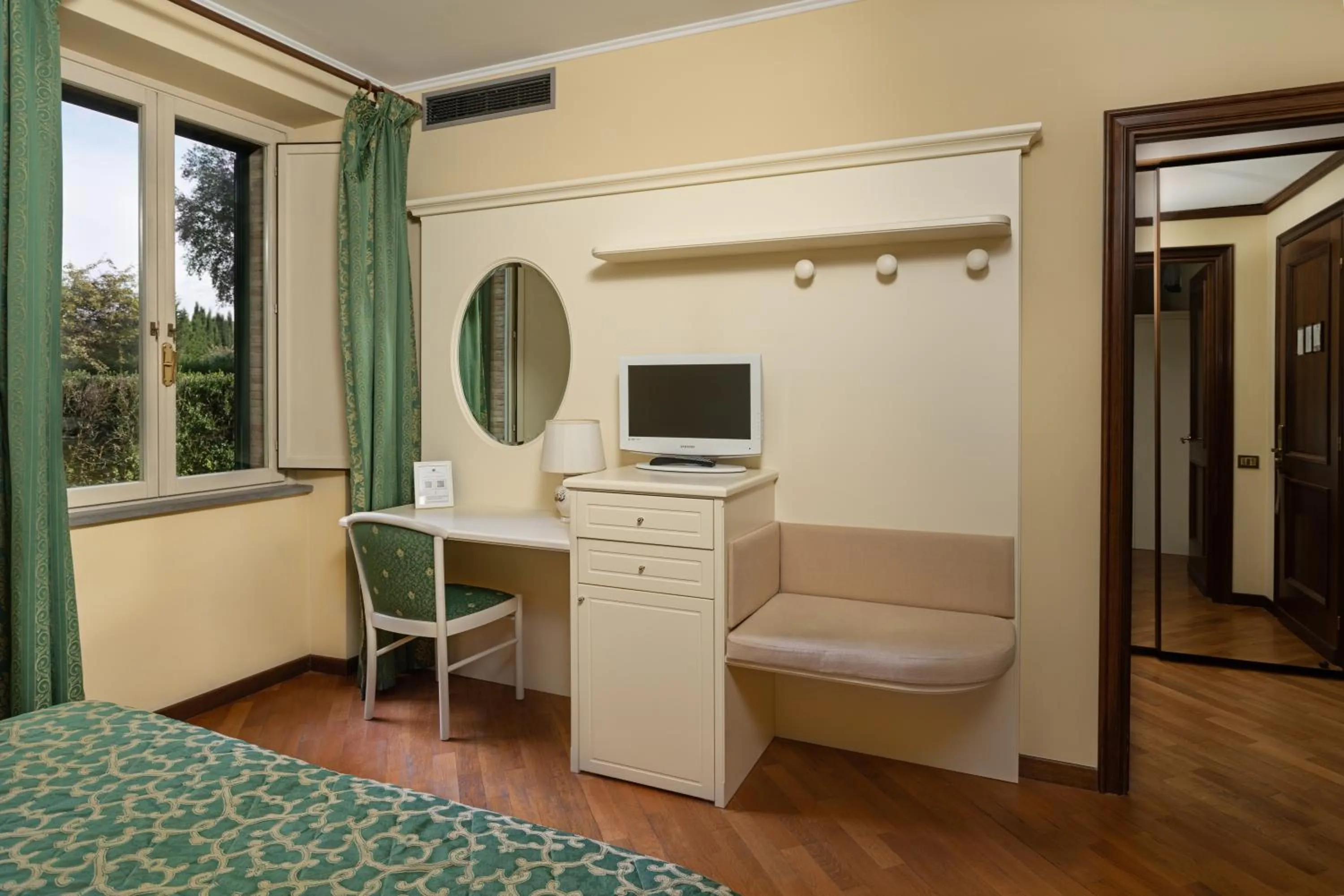 Bed, TV/Entertainment Center in Relais San Clemente