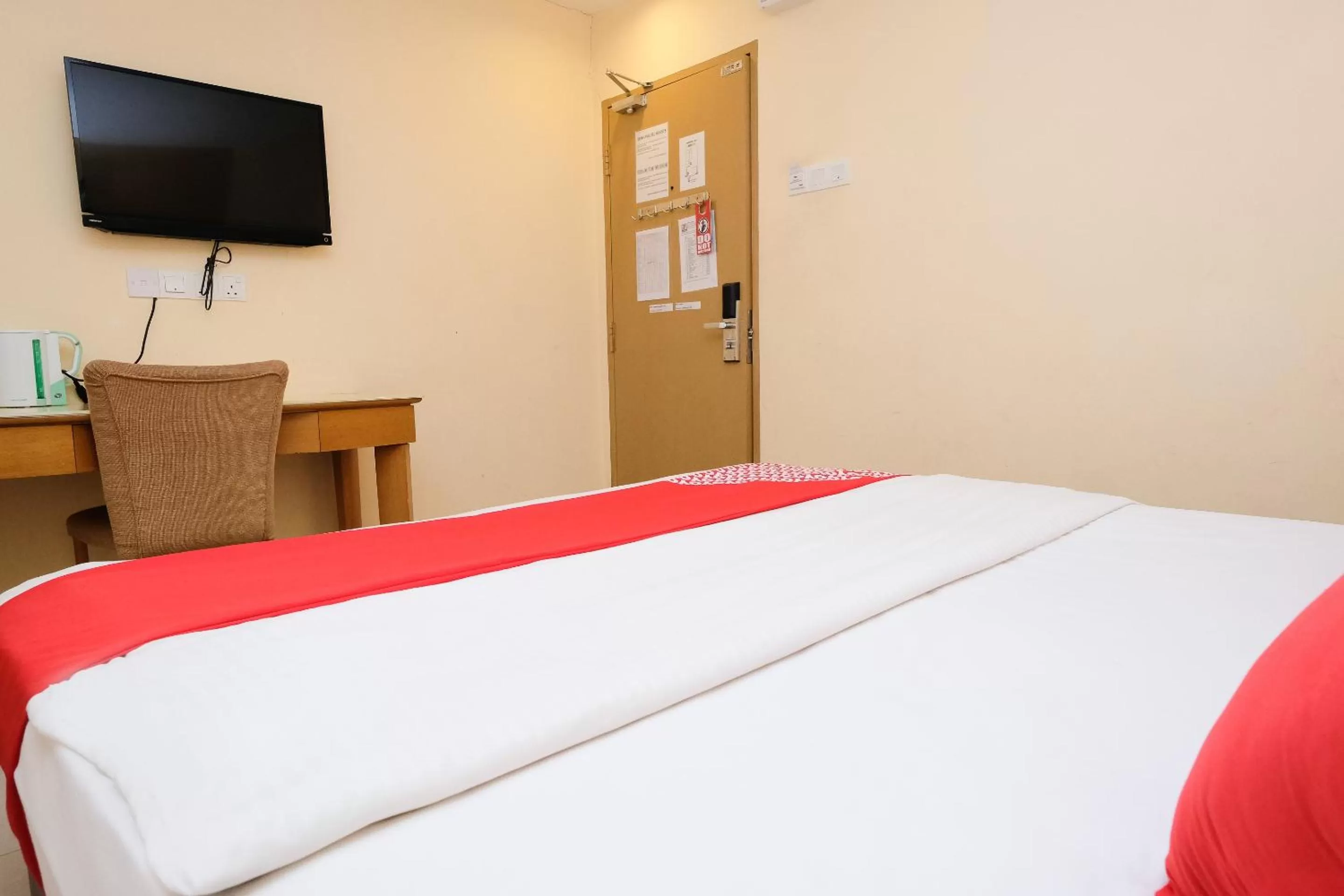 Bedroom in Super OYO 635 Seven Days Hotel