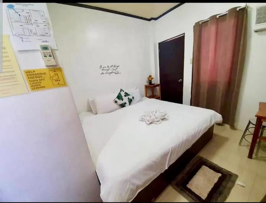 Bed in Kalis Viewpoint Lodge Coron