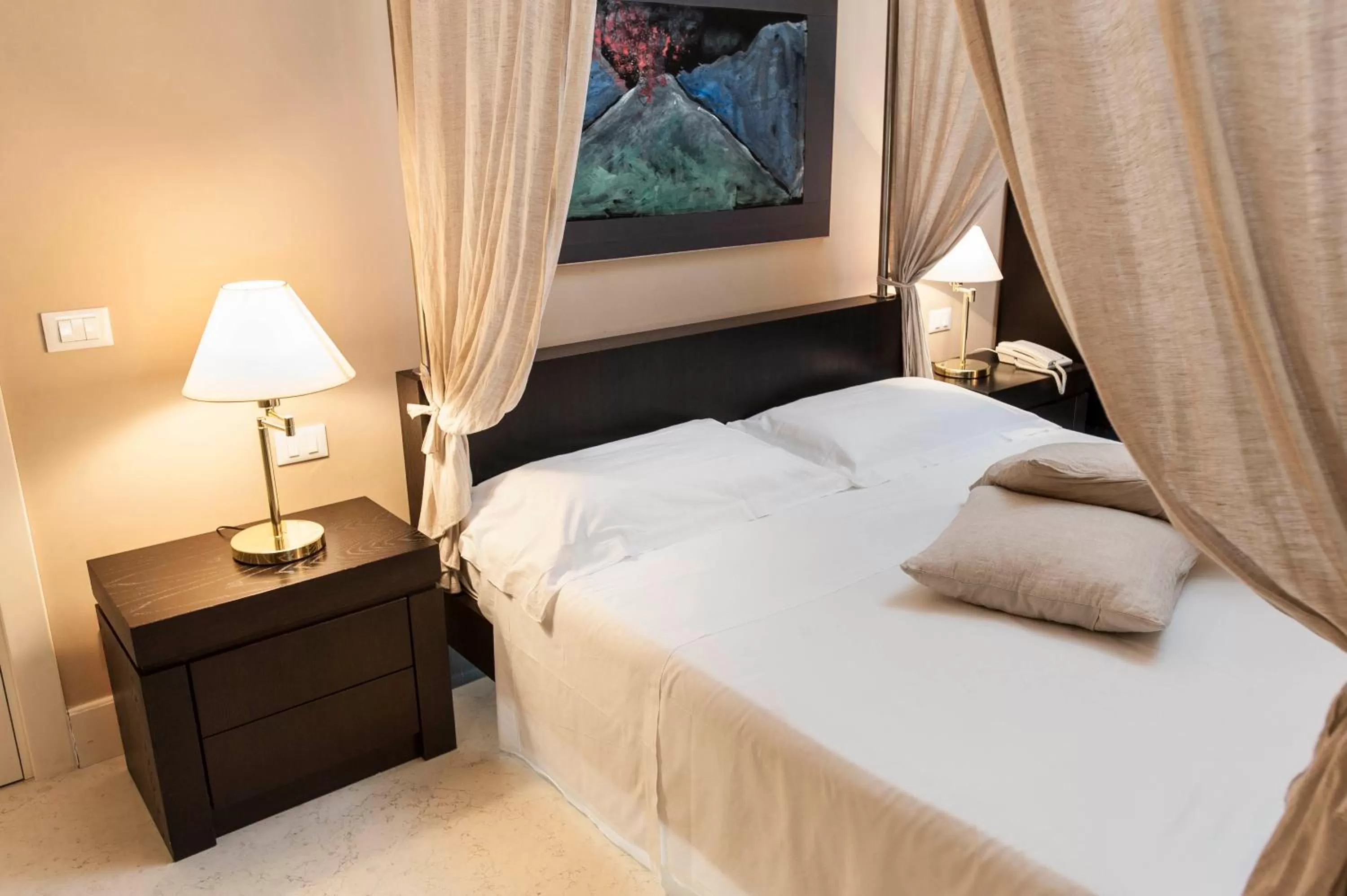 Decorative detail, Bed in Palazzo Brunaccini Boutique Hotel