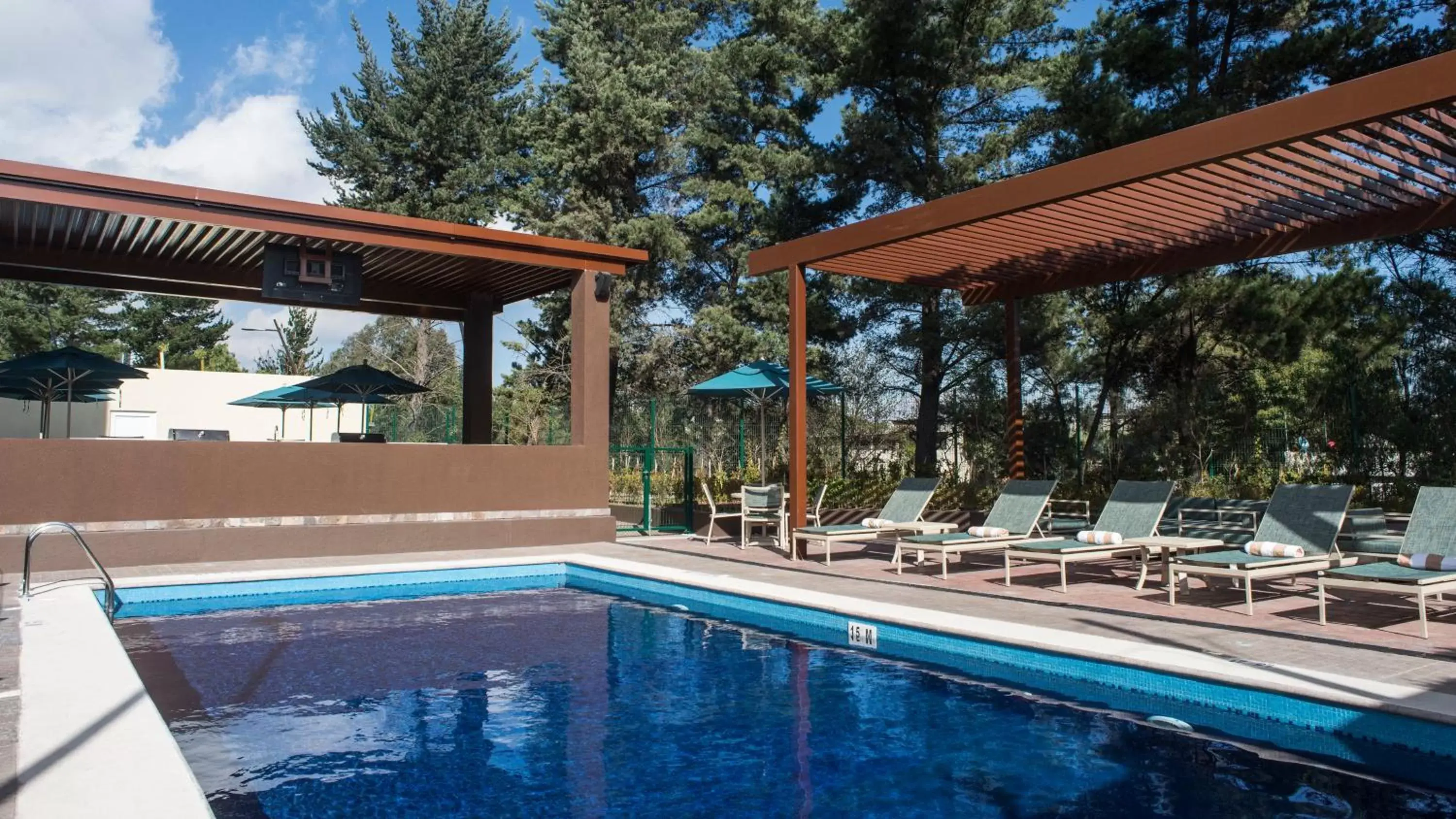 Swimming Pool in Staybridge Suites Puebla, an IHG Hotel
