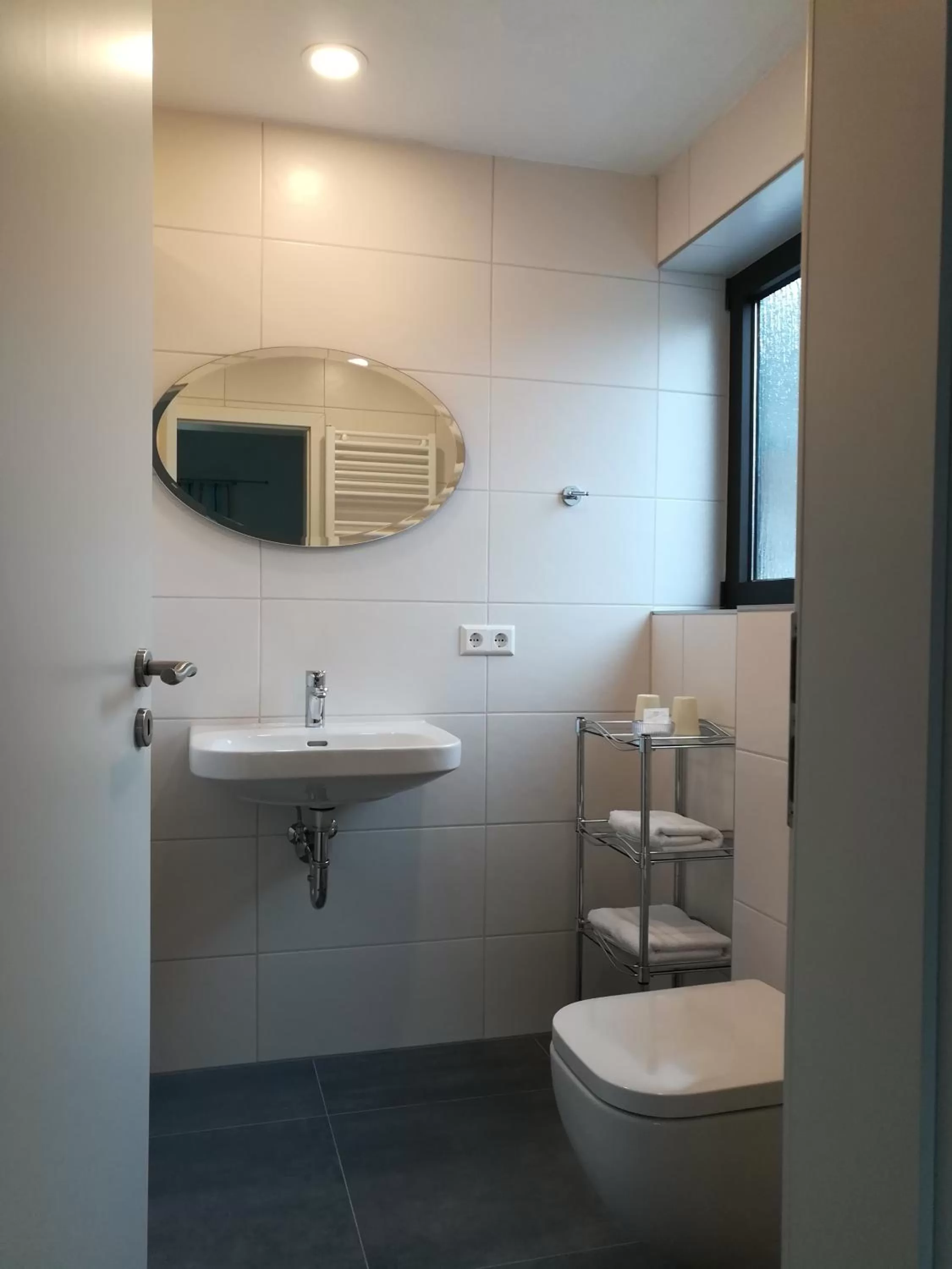 Bathroom in H41 Inn Hotel Garni Freiburg