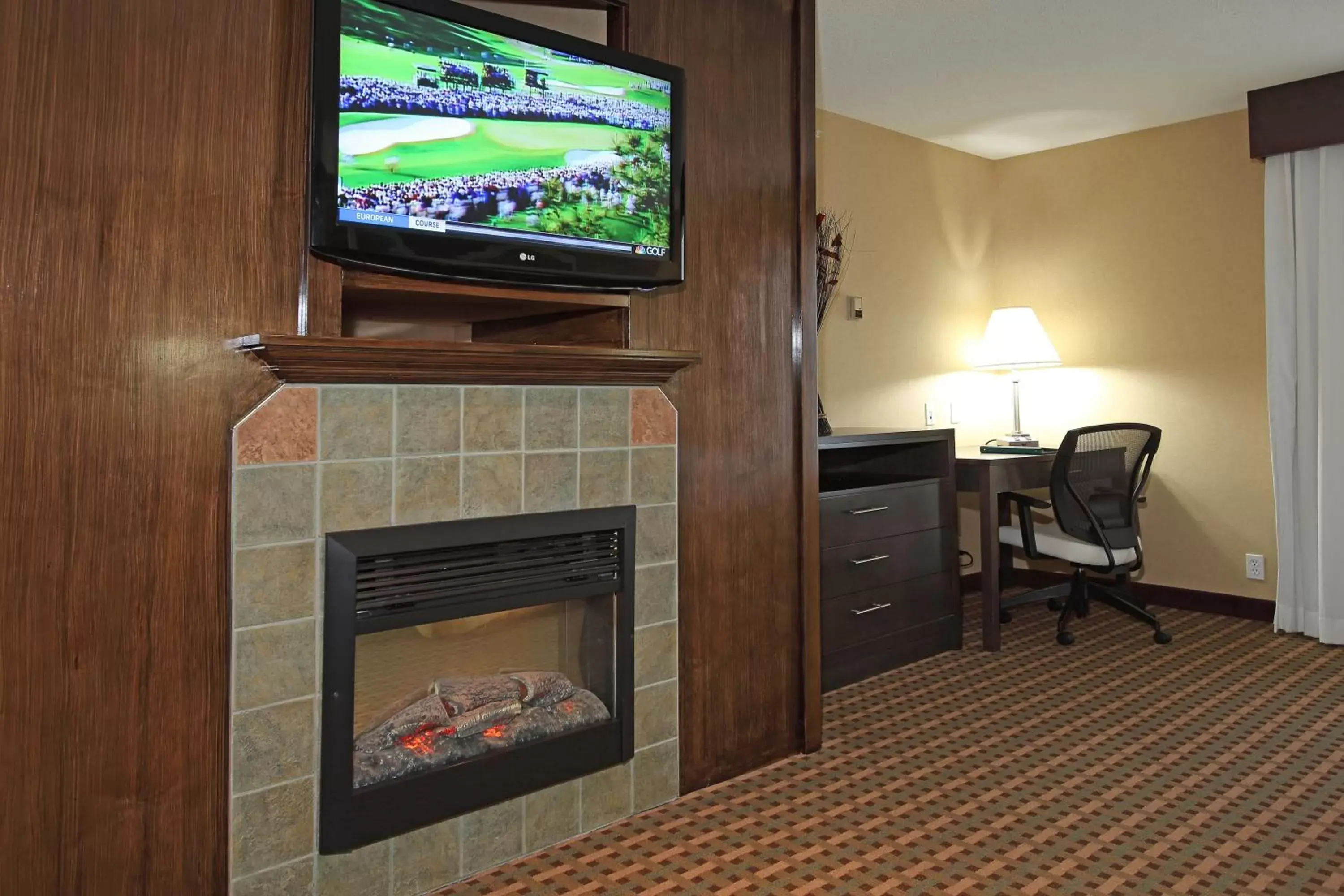 Photo of the whole room, TV/Entertainment Center in Holiday Inn Express Hotel & Suites Vernon, an IHG Hotel