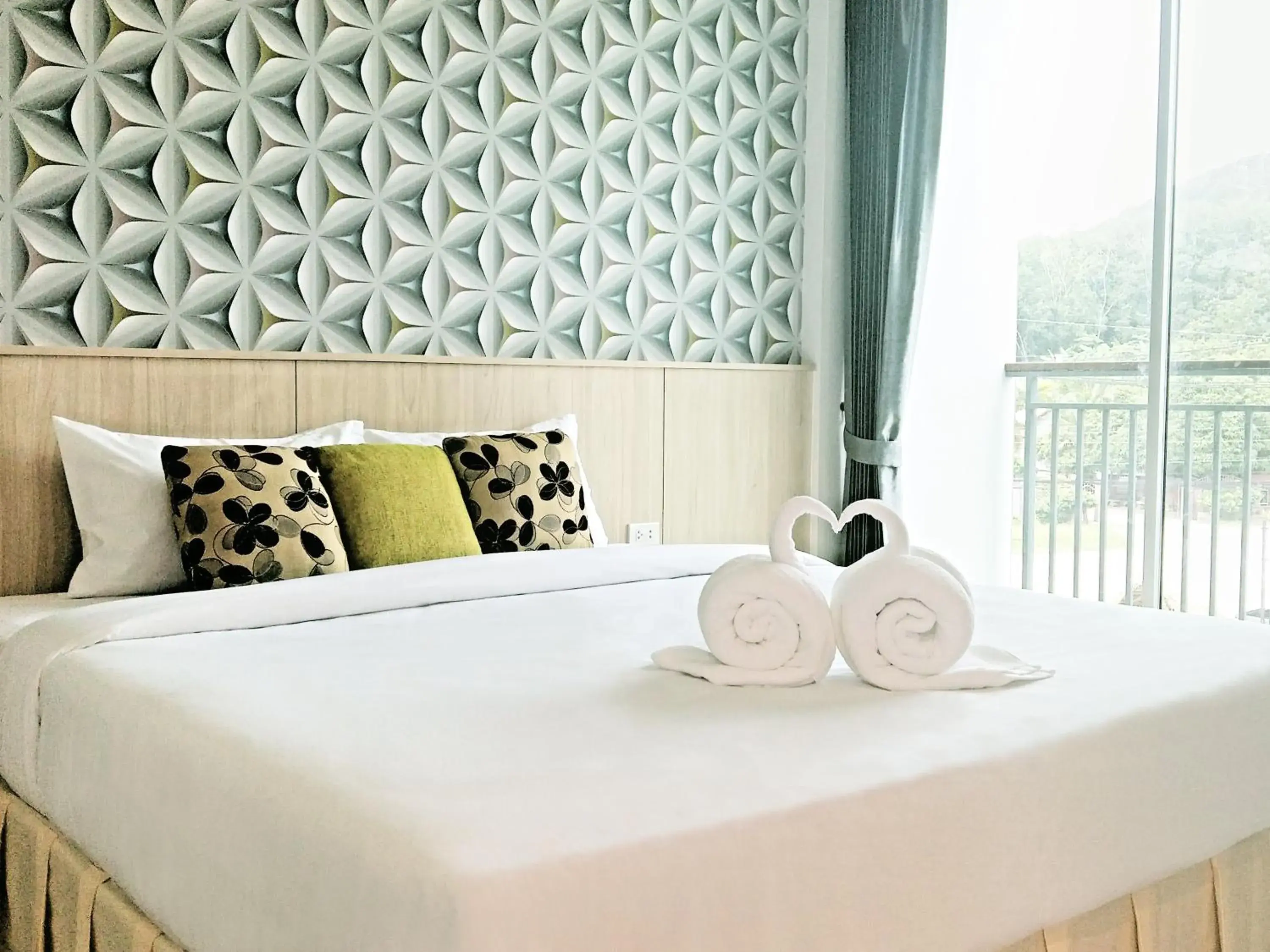 Bed in The Wings Boutique Hotels Krabi Koh Lanta