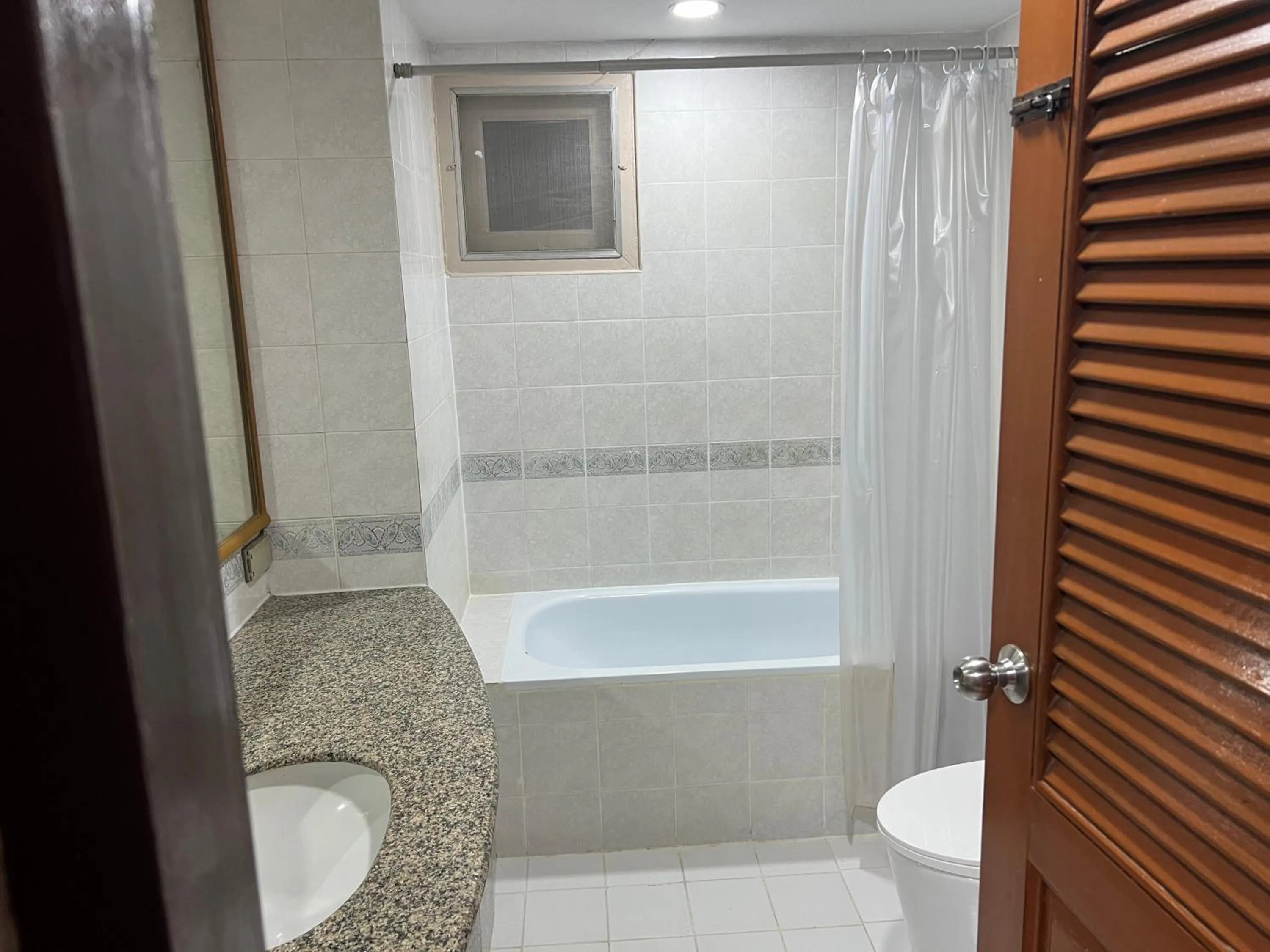 Shower in Mall Suites Hotel