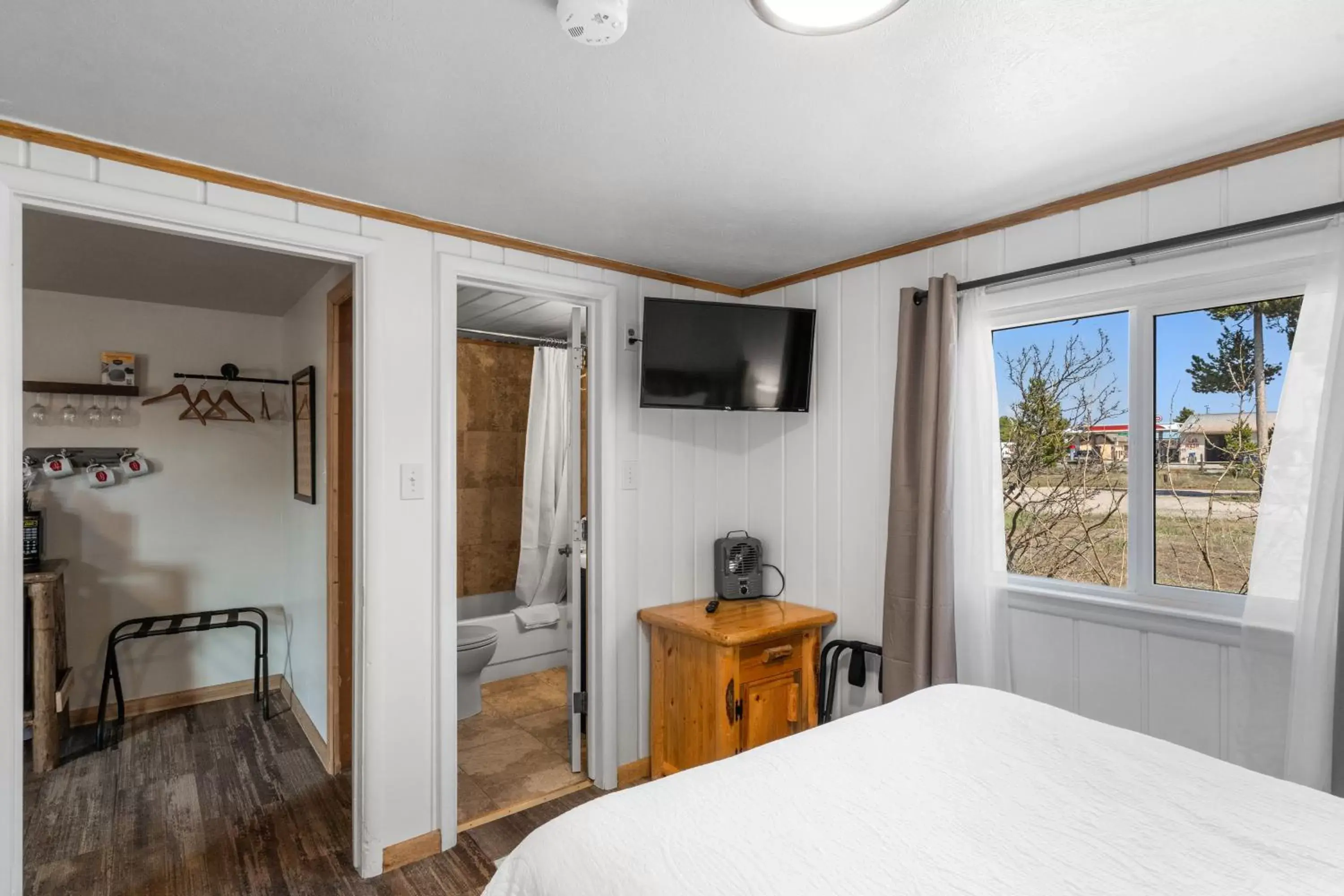 Bed, TV/Entertainment Center in The Bucking Moose