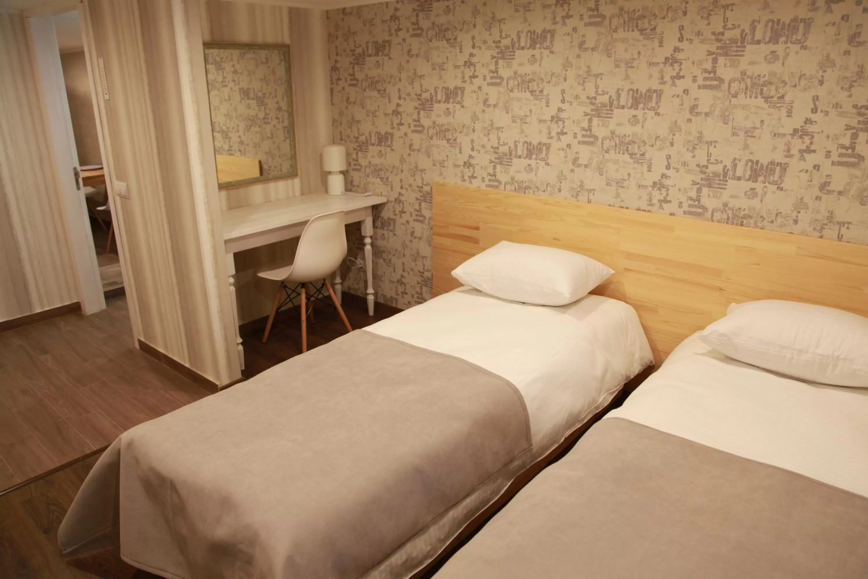 Bed in WINE & ROSE BOUTIQUE HOTEL