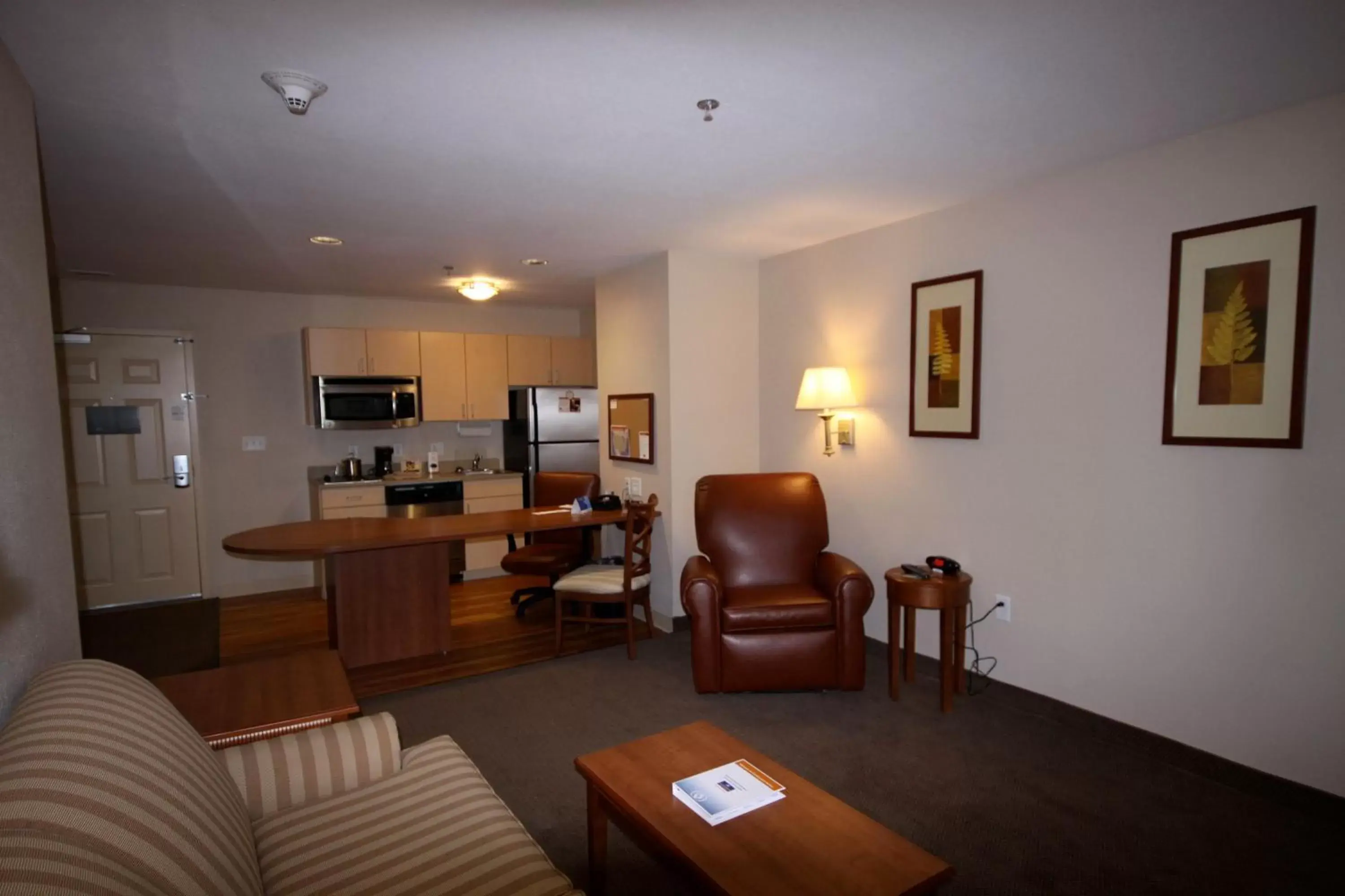 Photo of the whole room, Seating Area in Candlewood Suites Watertown Fort Drum, an IHG Hotel