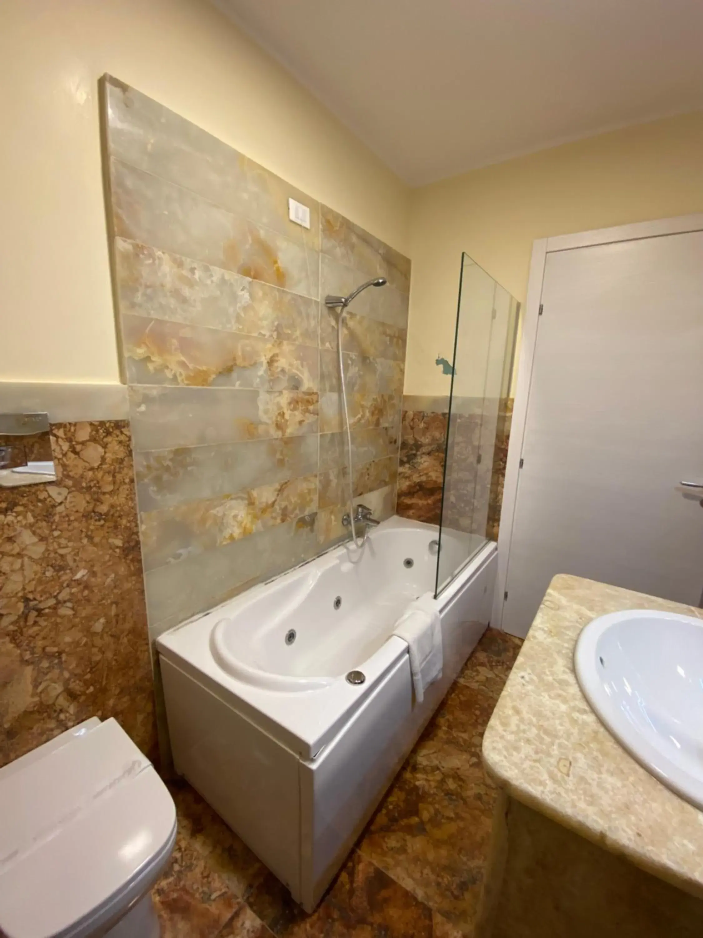 Bathroom in 55 Aira Hotel