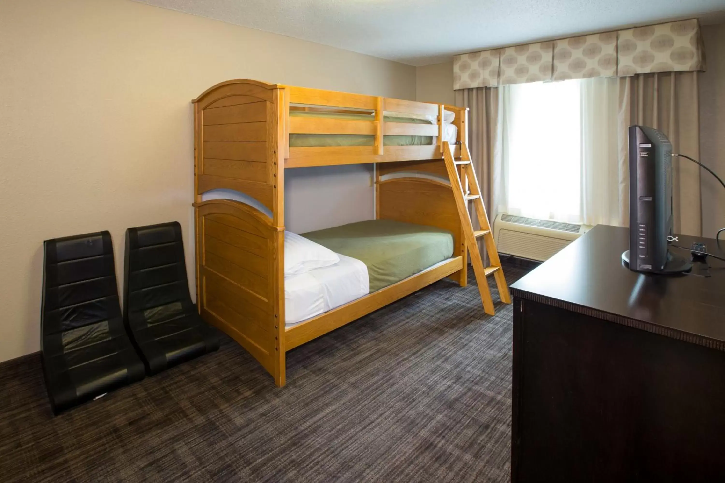 Photo of the whole room, Bunk Bed in Holiday Inn Express Hotel & Suites-Saint Joseph, an IHG Hotel